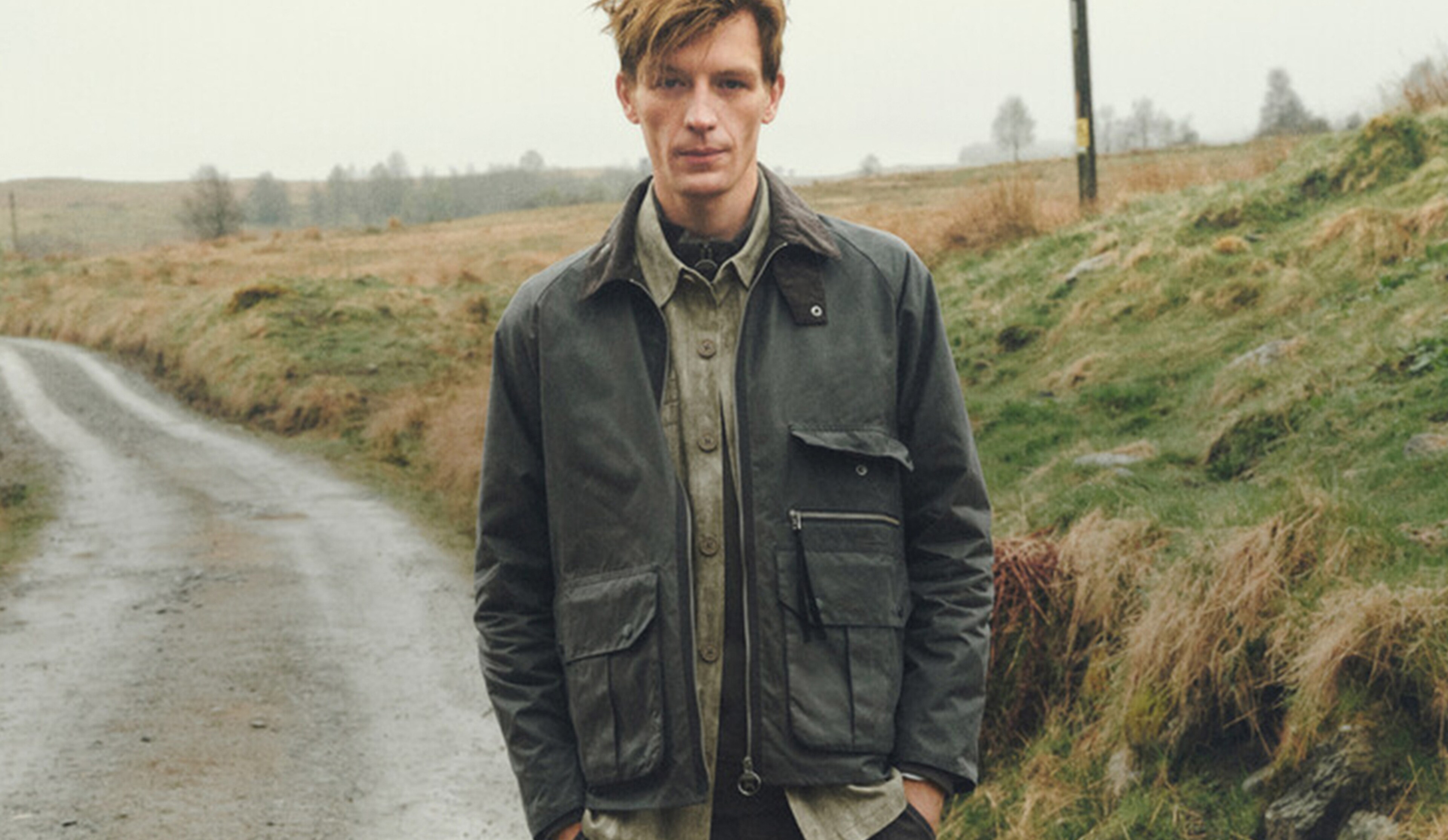 Model is wearing a Barbour Bedale wax jacket.