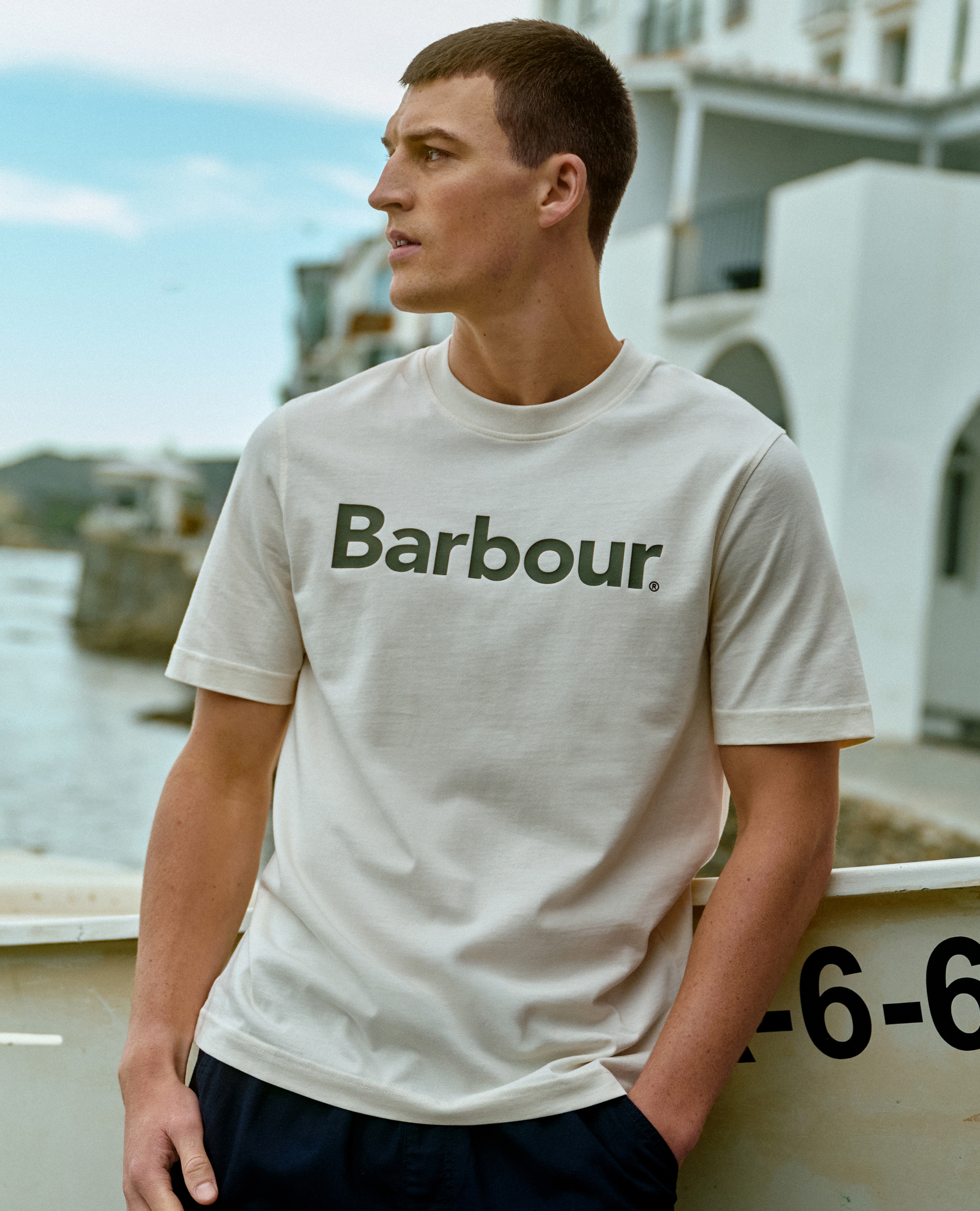 Model wears Barbour Short Sleeve Logo Relaxed T-Shirt - White