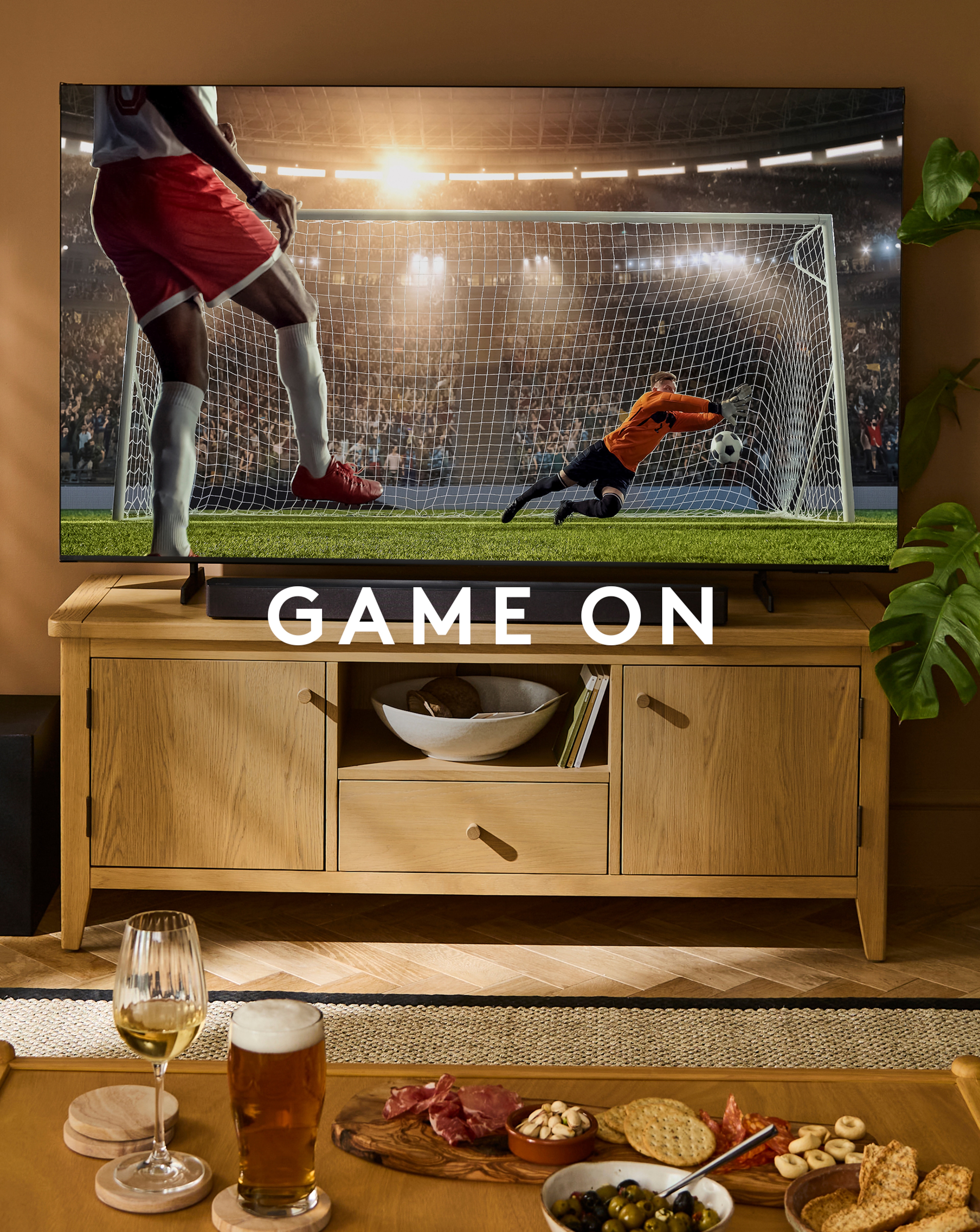 Game on! TV showing football