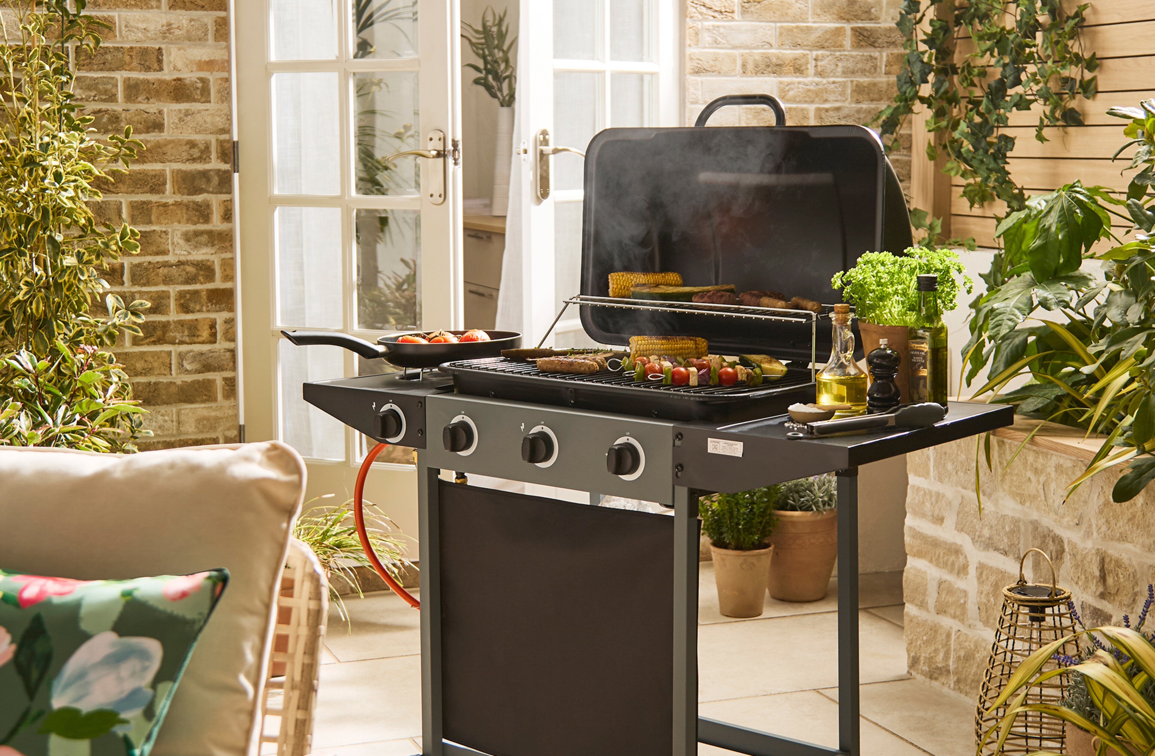 Double Oil Drum Charcoal BBQ is pictured