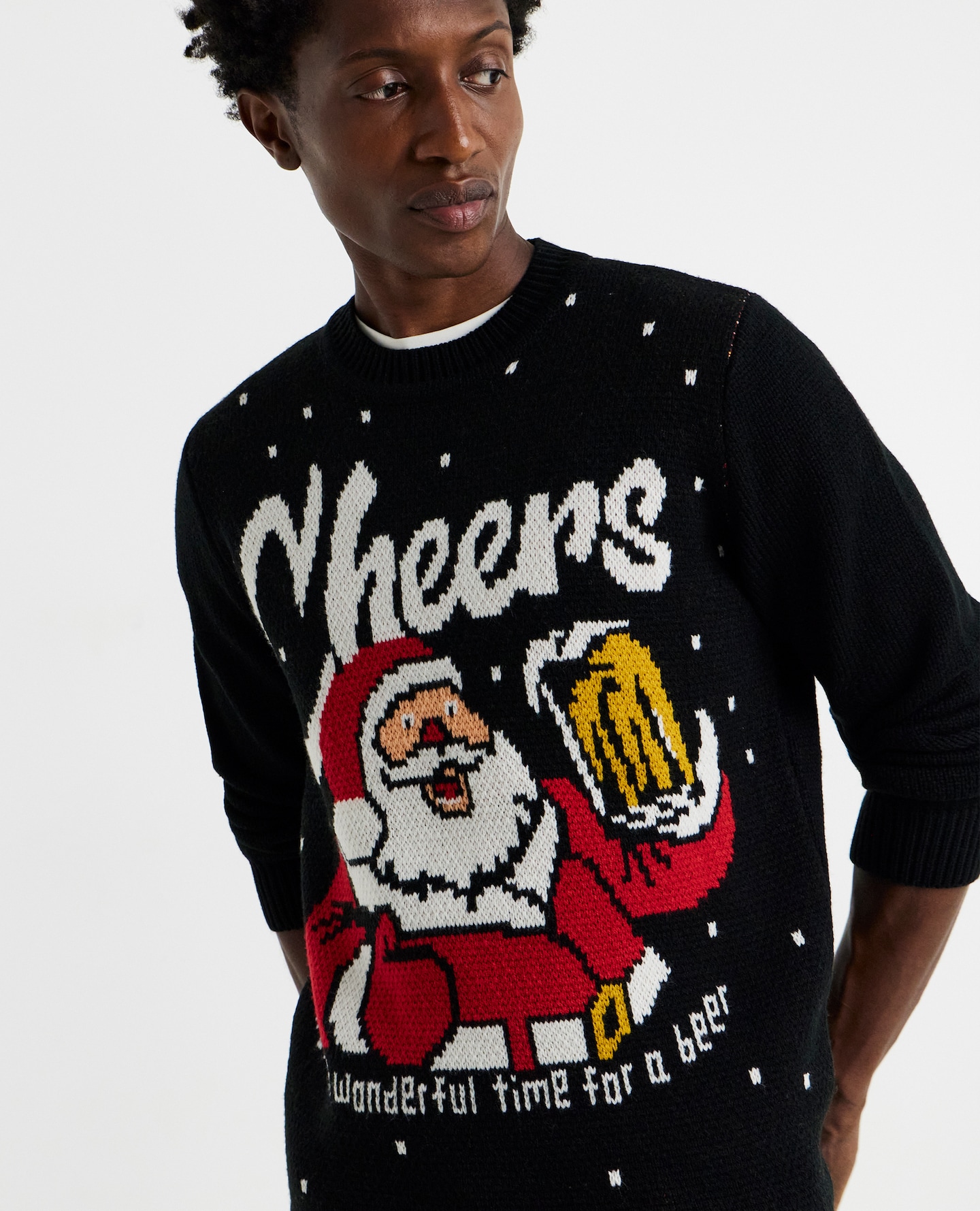 Model wears Santa Cheers Knitted Christmas Jumper