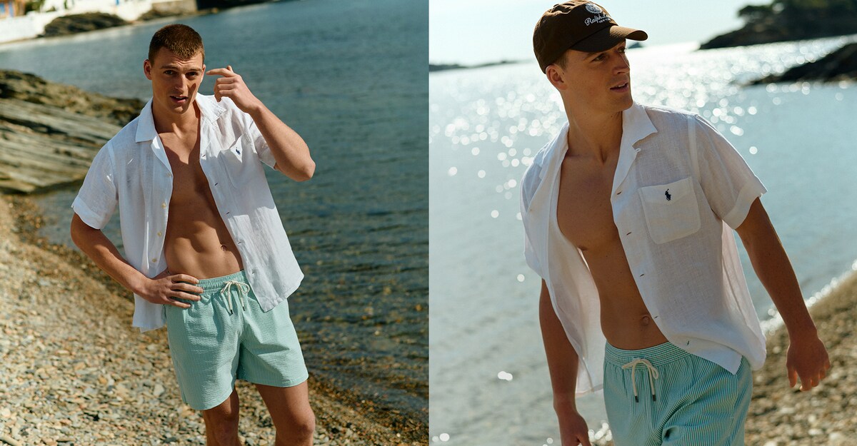 Model wears Polo Ralph Lauren Seersucker Swimshort - Green/White with Polo Ralph Lauren Short Sleeve Linen Resort Shirt - White