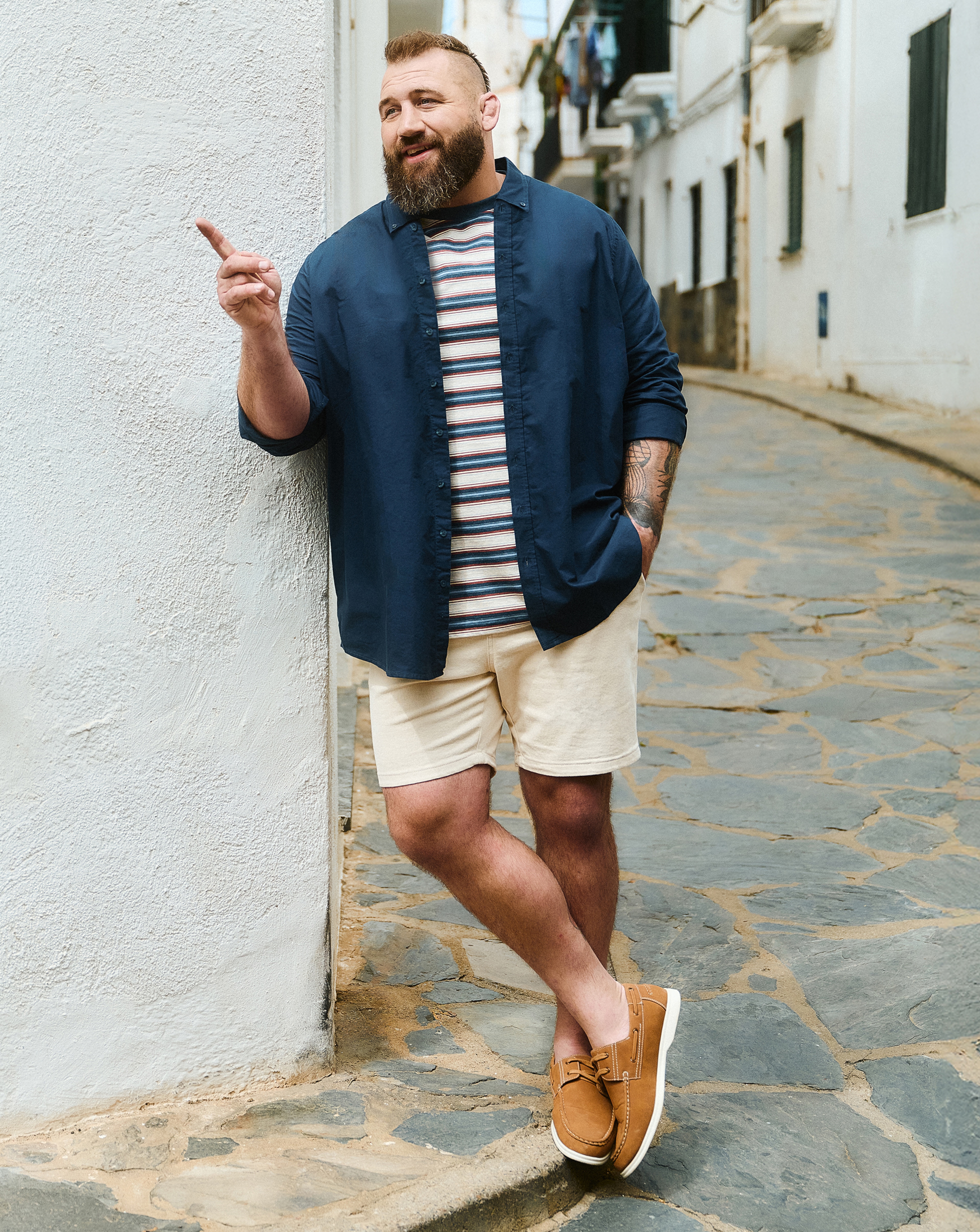 Joe Marler wears Union Relaxed Fit Marl Yarn Dye Stripe T-Shirt Long with Long Sleeve Blue Shirt