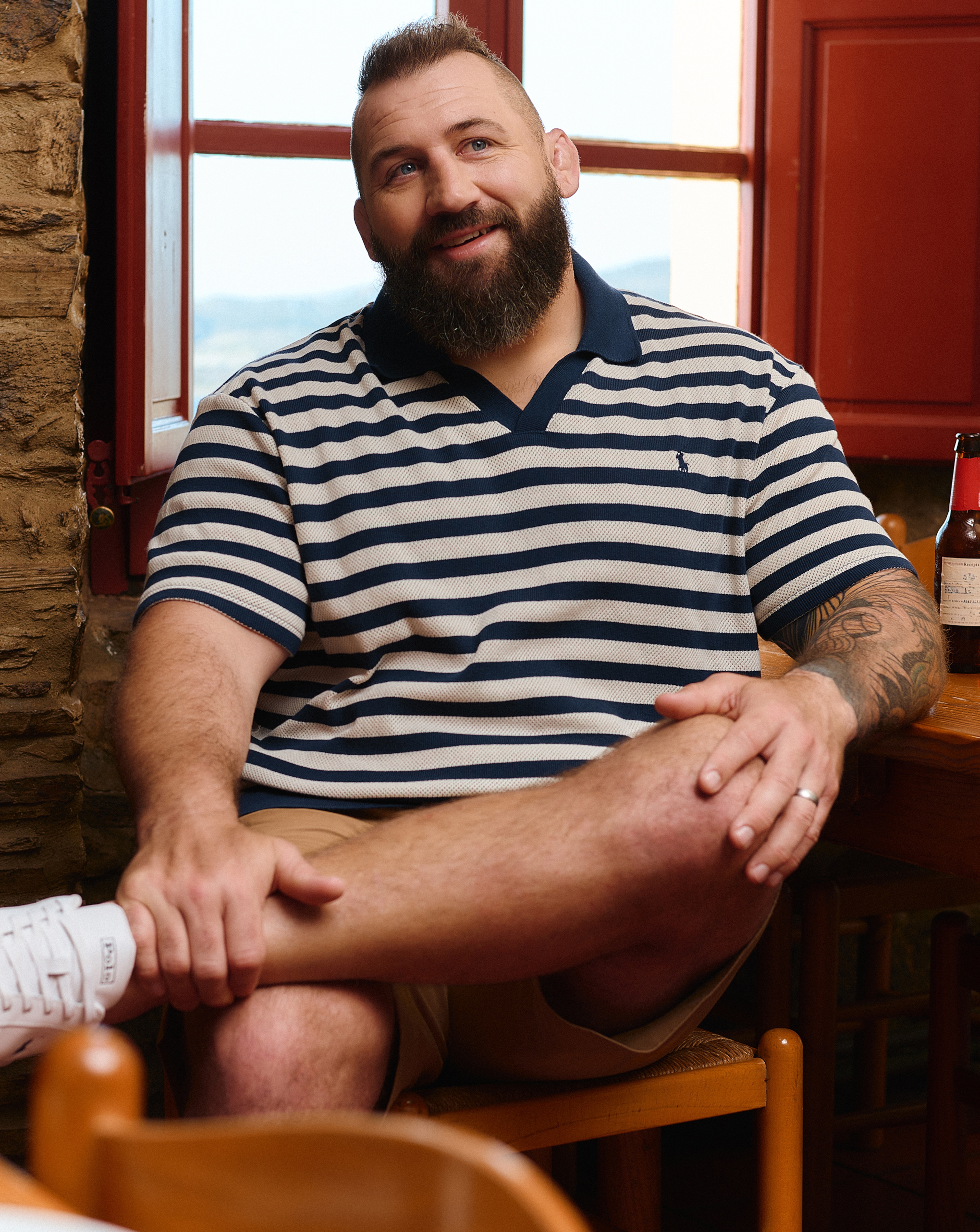 Joe Marler wears Polo Ralph Lauren Short Sleeve Stripe Polo - Navy/Cream
