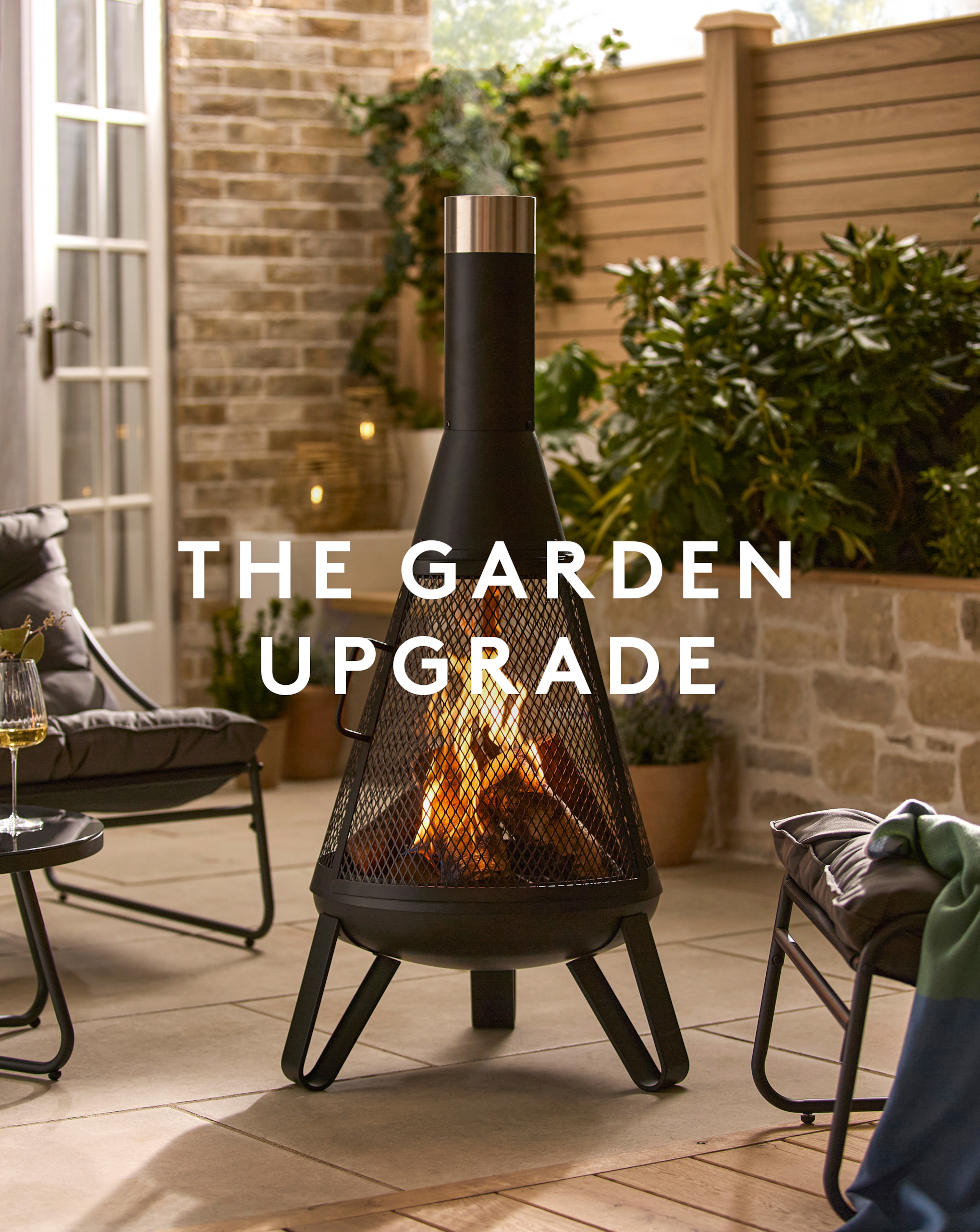 The Garden Upgrade. Wood Burner in garden setting is pictured.