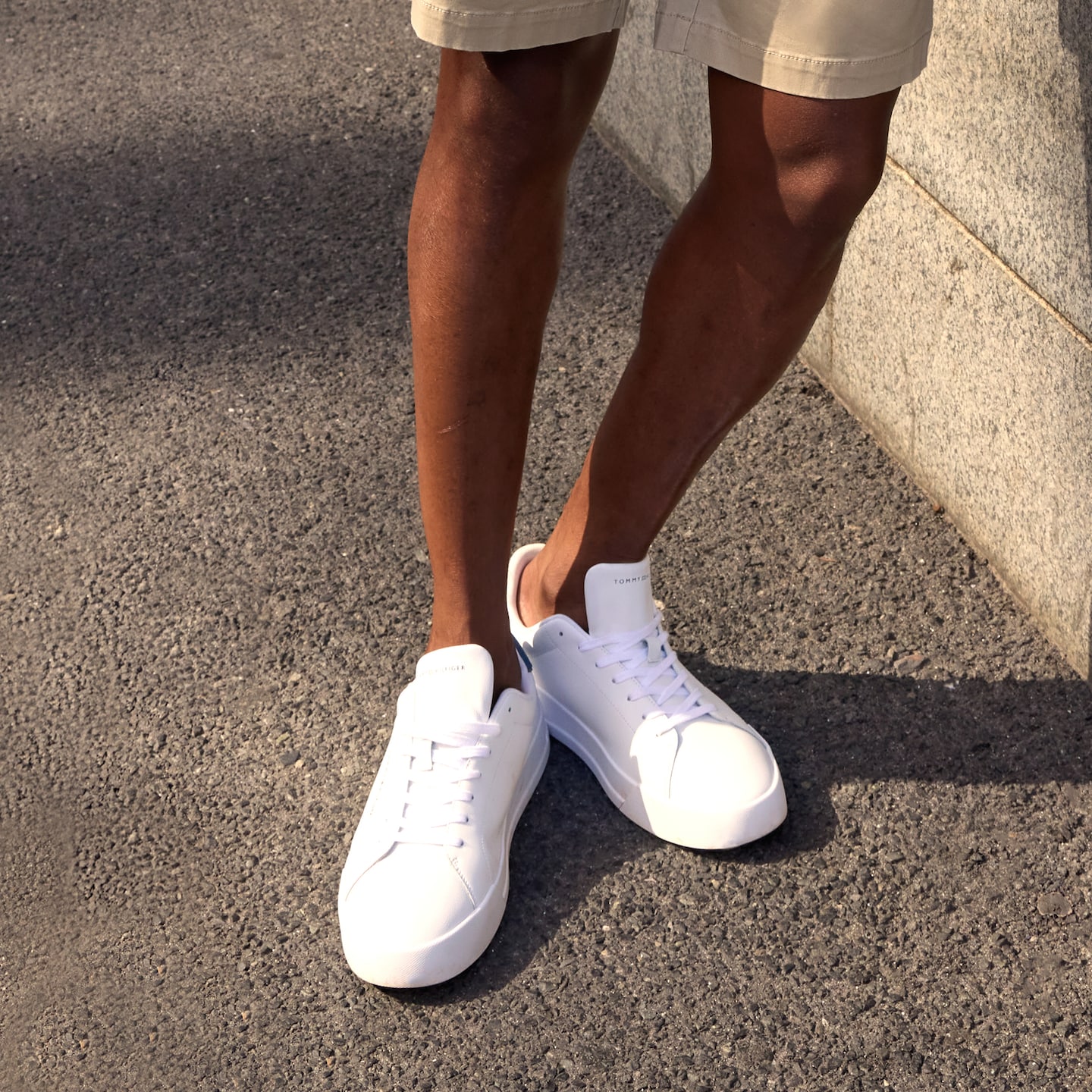 Model wears Tommy Hilfiger Premium Cupsole Leather Trainer - White