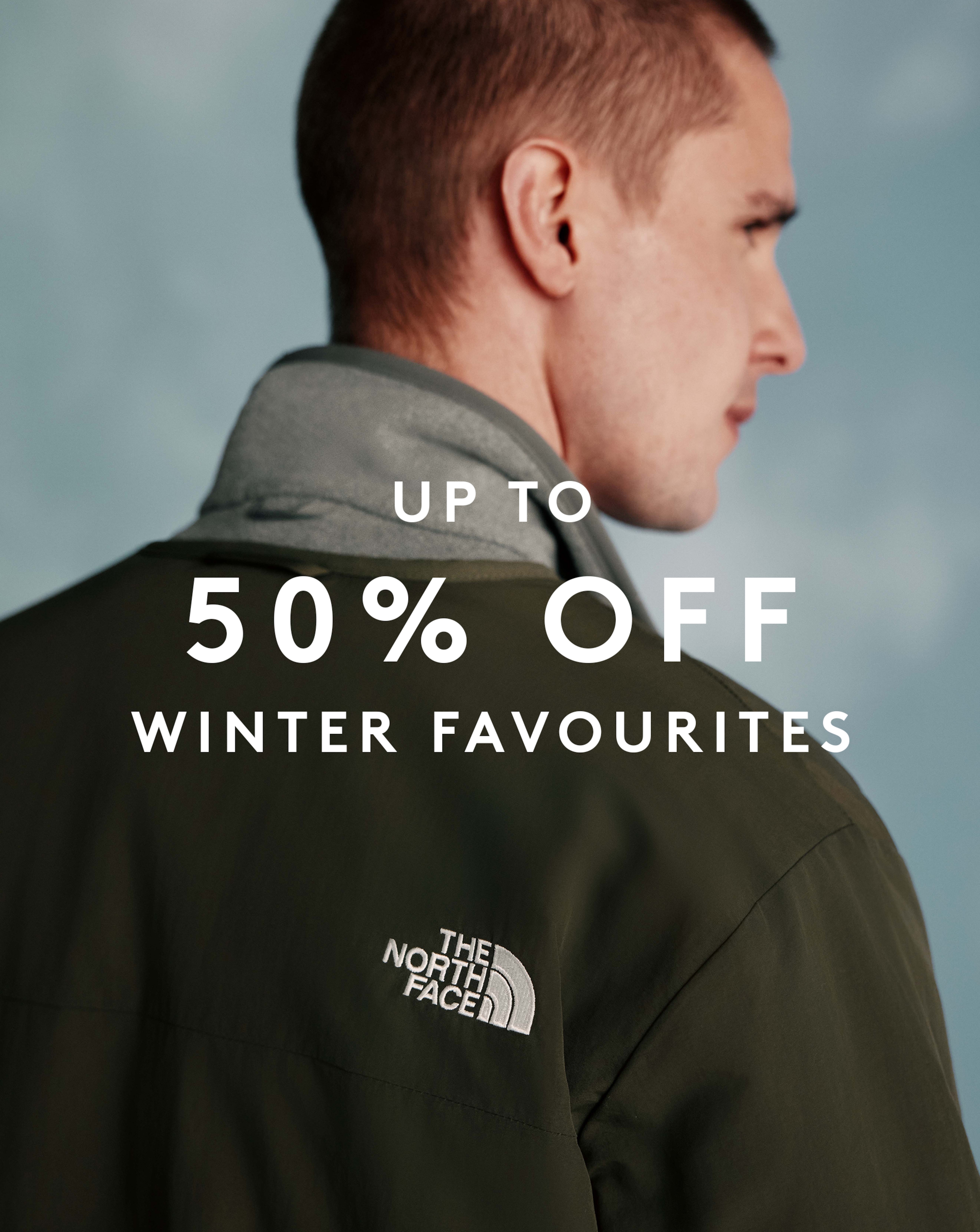 The North Face Liner Jacket in Dark Green is pictured.