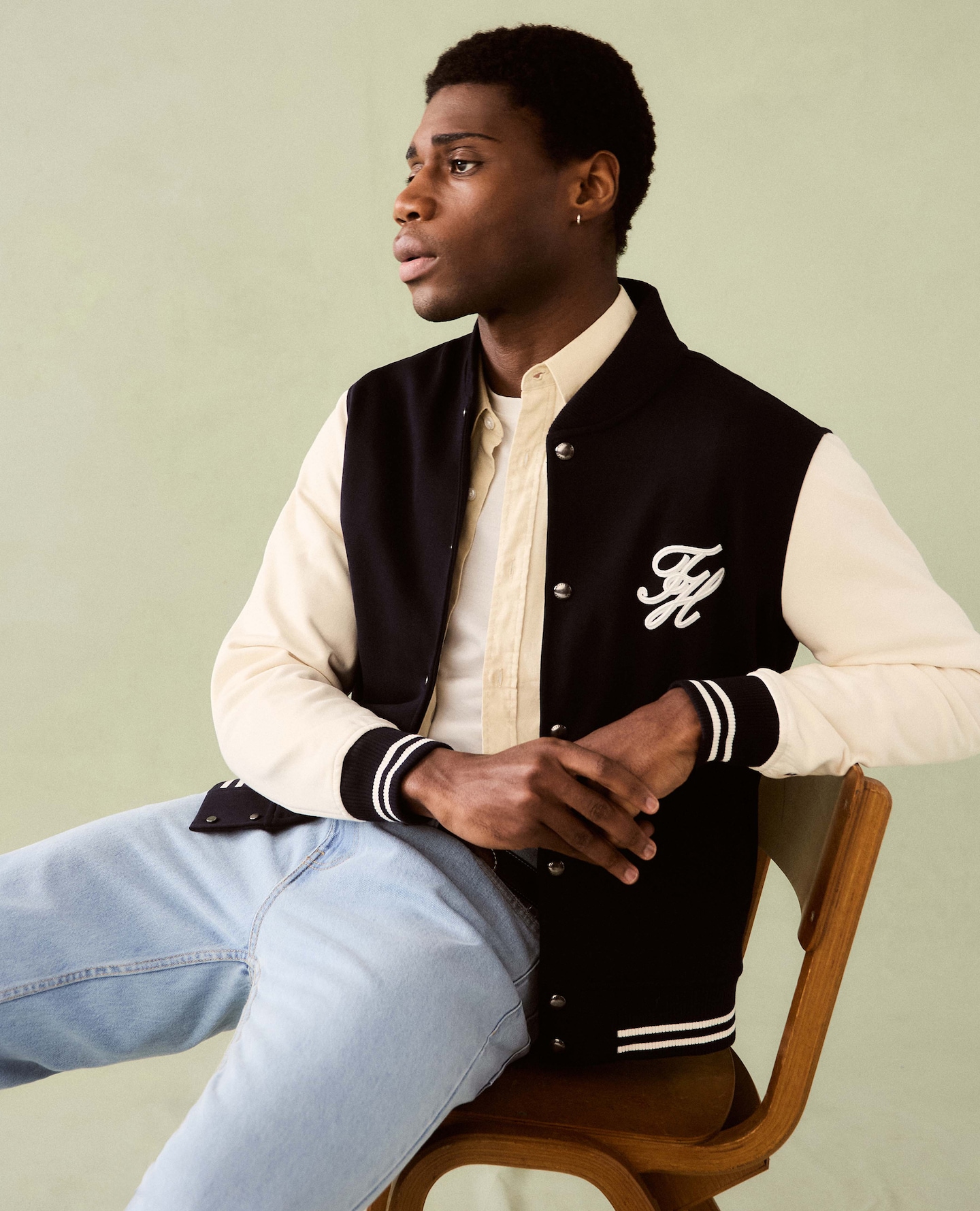 Model wears Tommy Hilfiger Script Colourblock Bomber Jacket - Navy