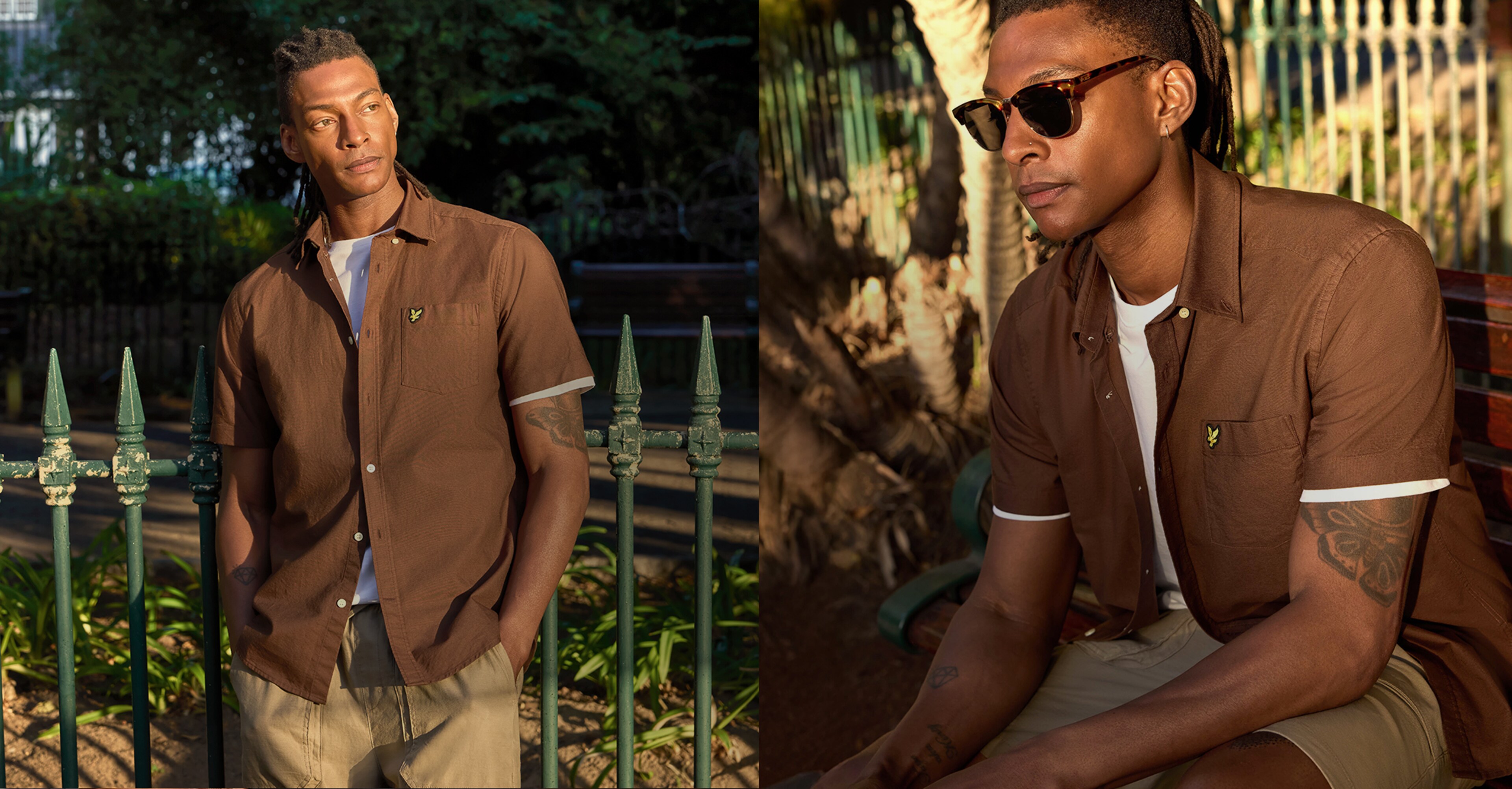 Model wears Lyle & Scott Short Sleeve Oxford Shirt - Walnut sat in a Summer park