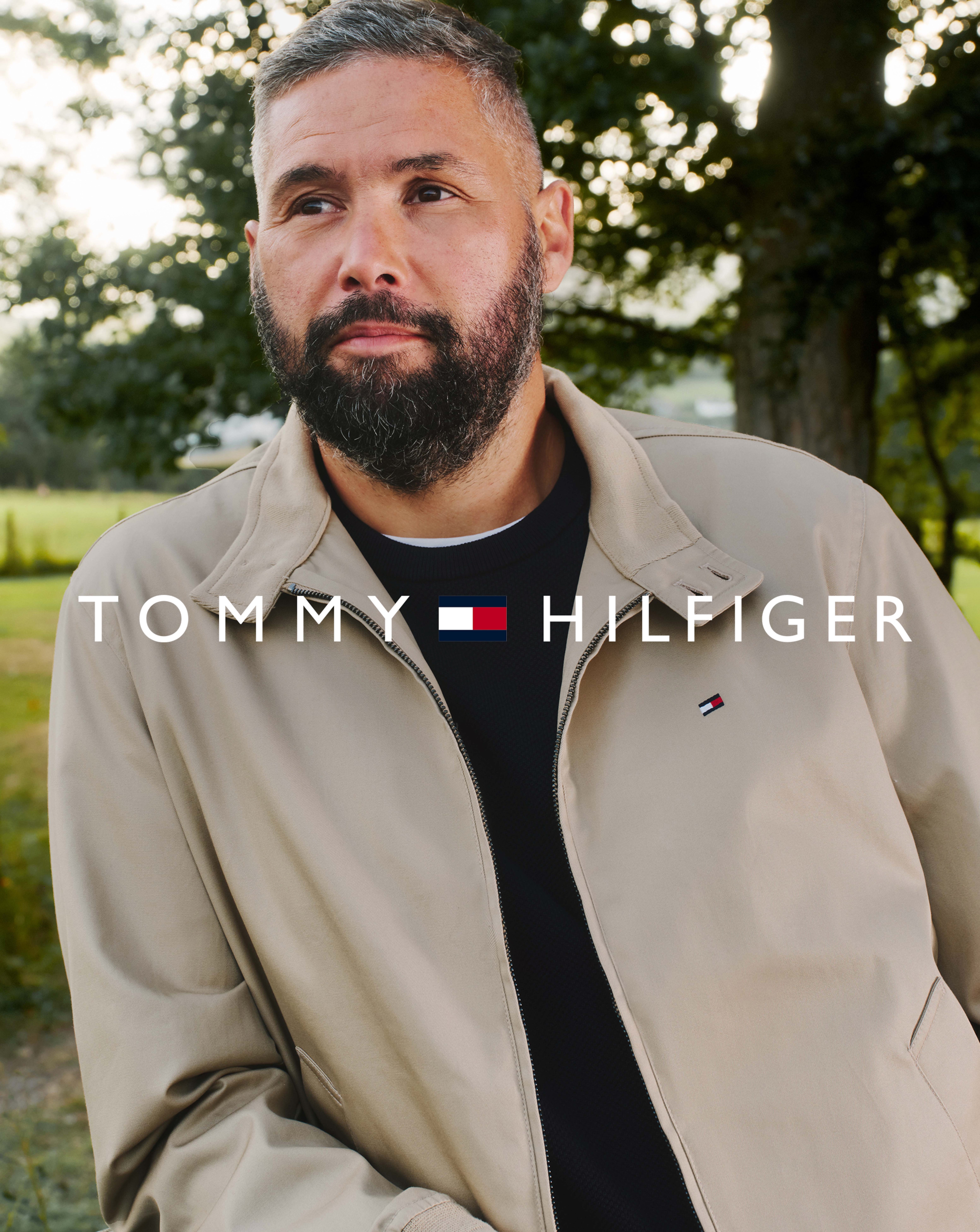 Tony Bellew wears Tommy Hilfiger Classic Harrington Jacket - Beige with Tommy Hilfiger Jeans