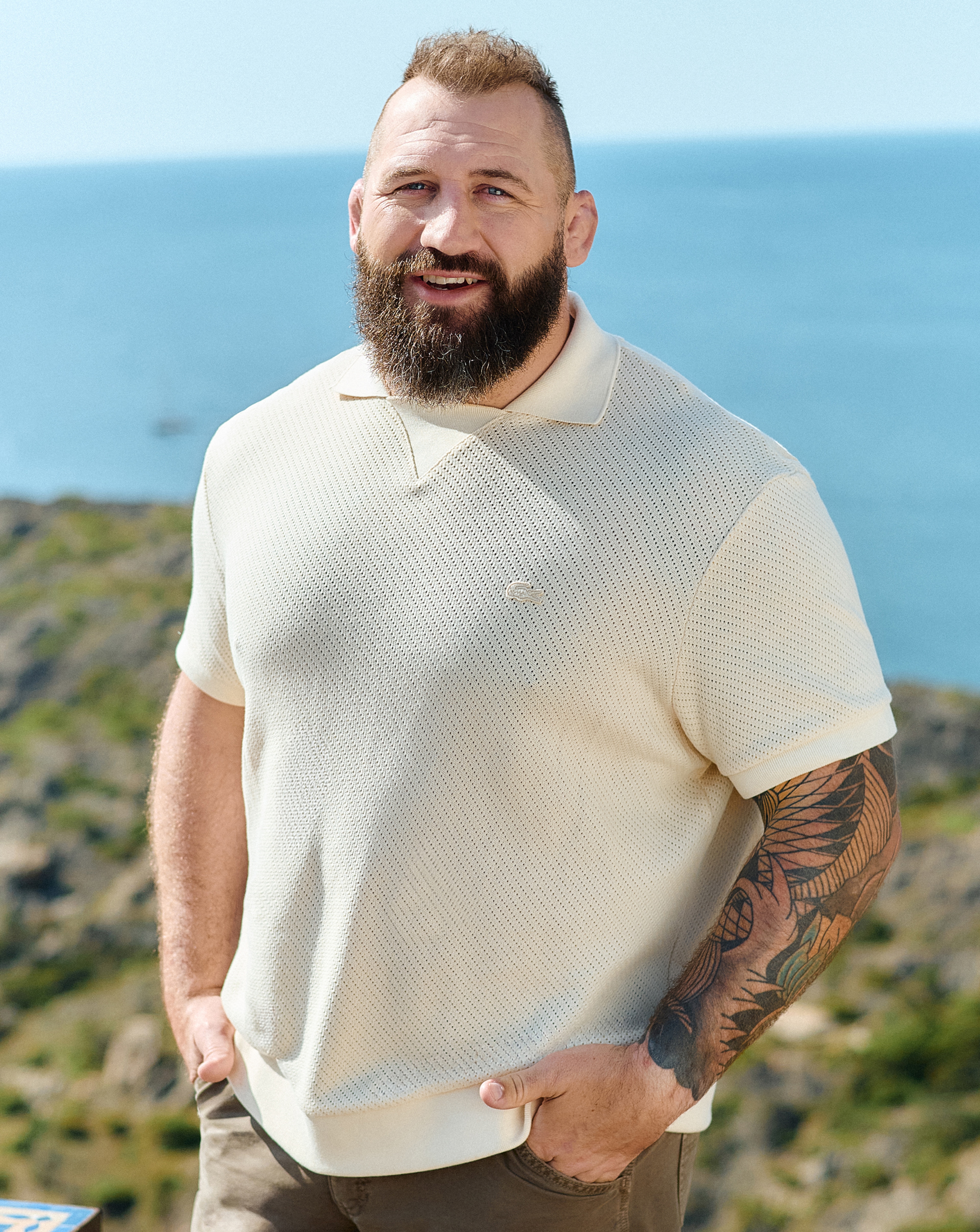 Joe Marler wears Lacoste Lacoste Short Sleeve Open Neck Textured Polo - Natural