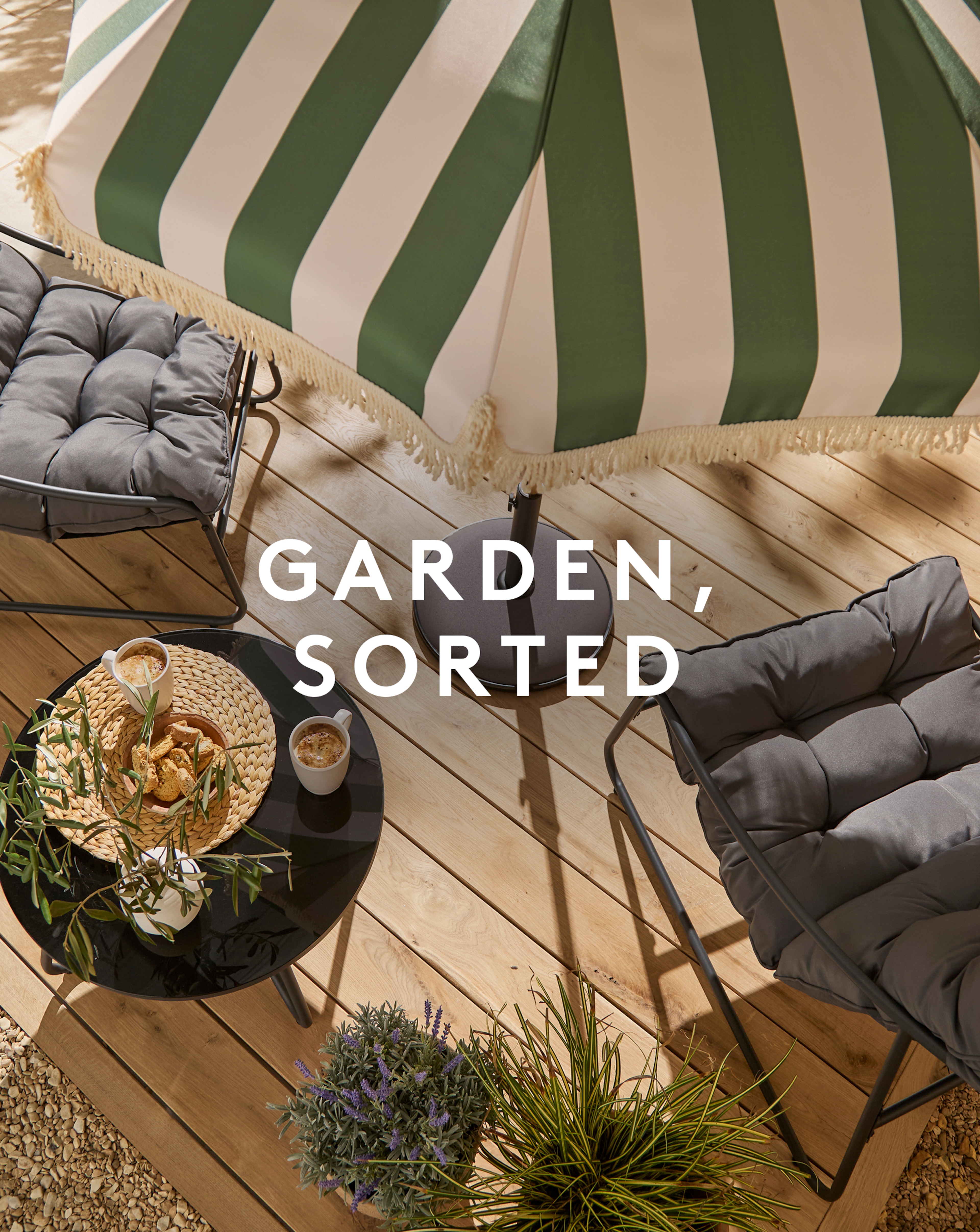 Garden, sorted. Stripe Parasol with Grey Outdoor Chairs