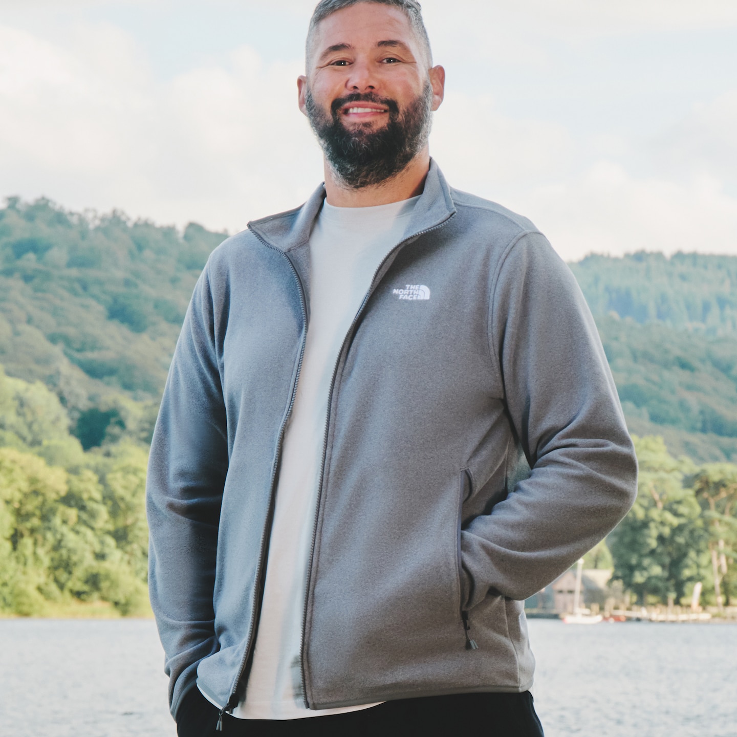 Tony wears grey mid layer from The North Face