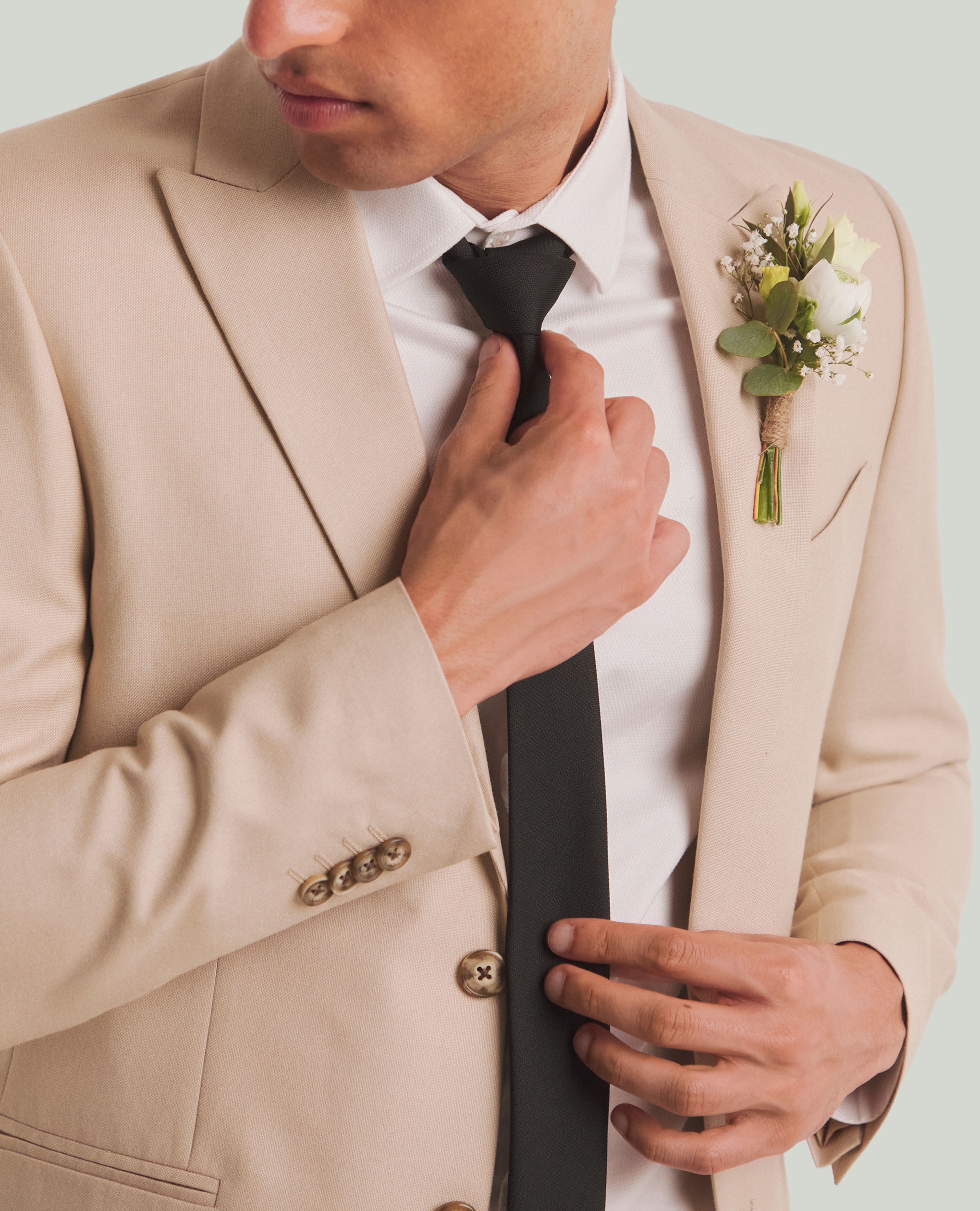 Model wears Tailored Suit Jacket in stone