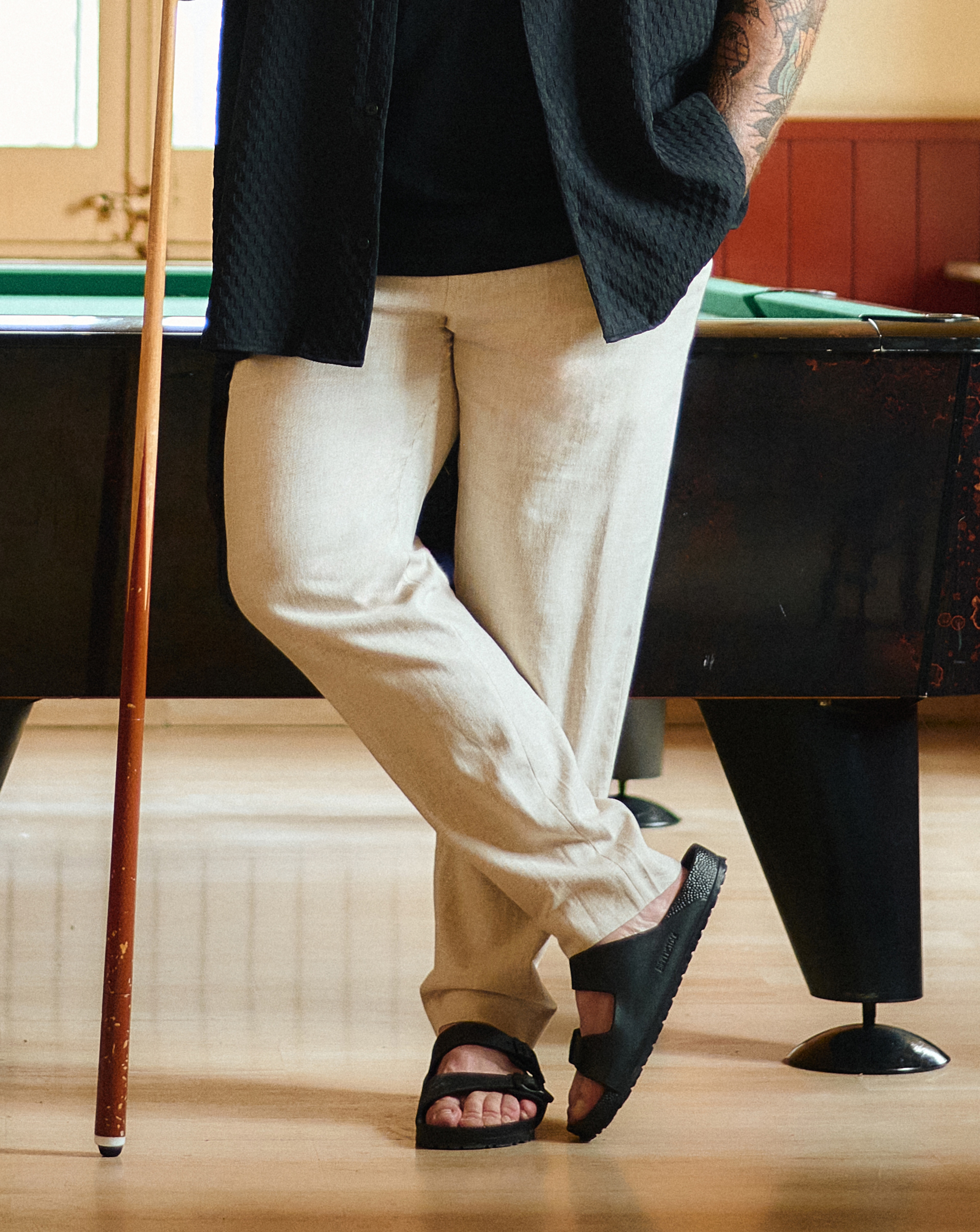 Joe Marler wears Linen Blend Straight Fit Trouser with Birkenstock Classic Smooth Leather Arizona Sandals