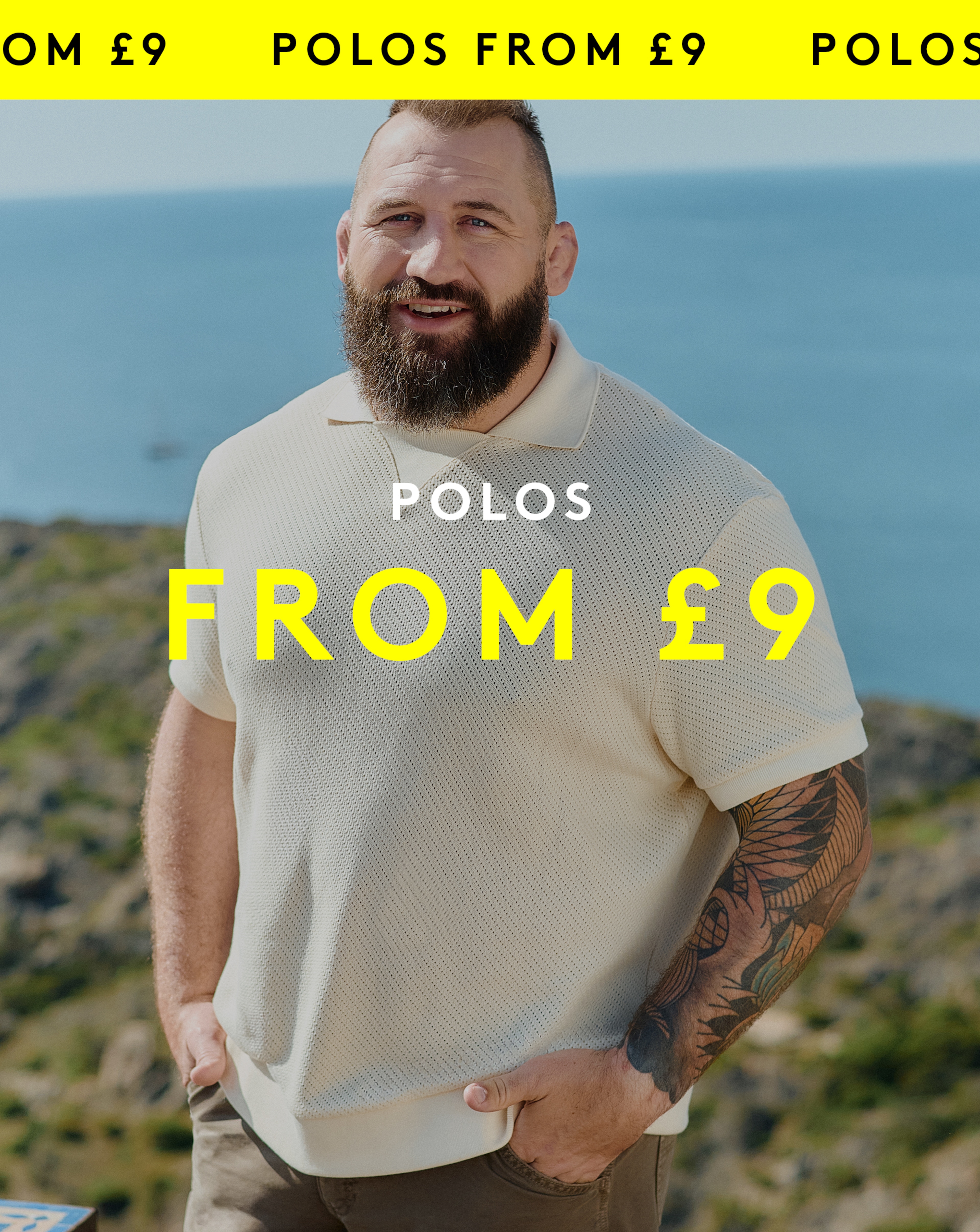 Joe is wearing a natural Lacoste short sleeve open neck textured polo with a pair of shorts.