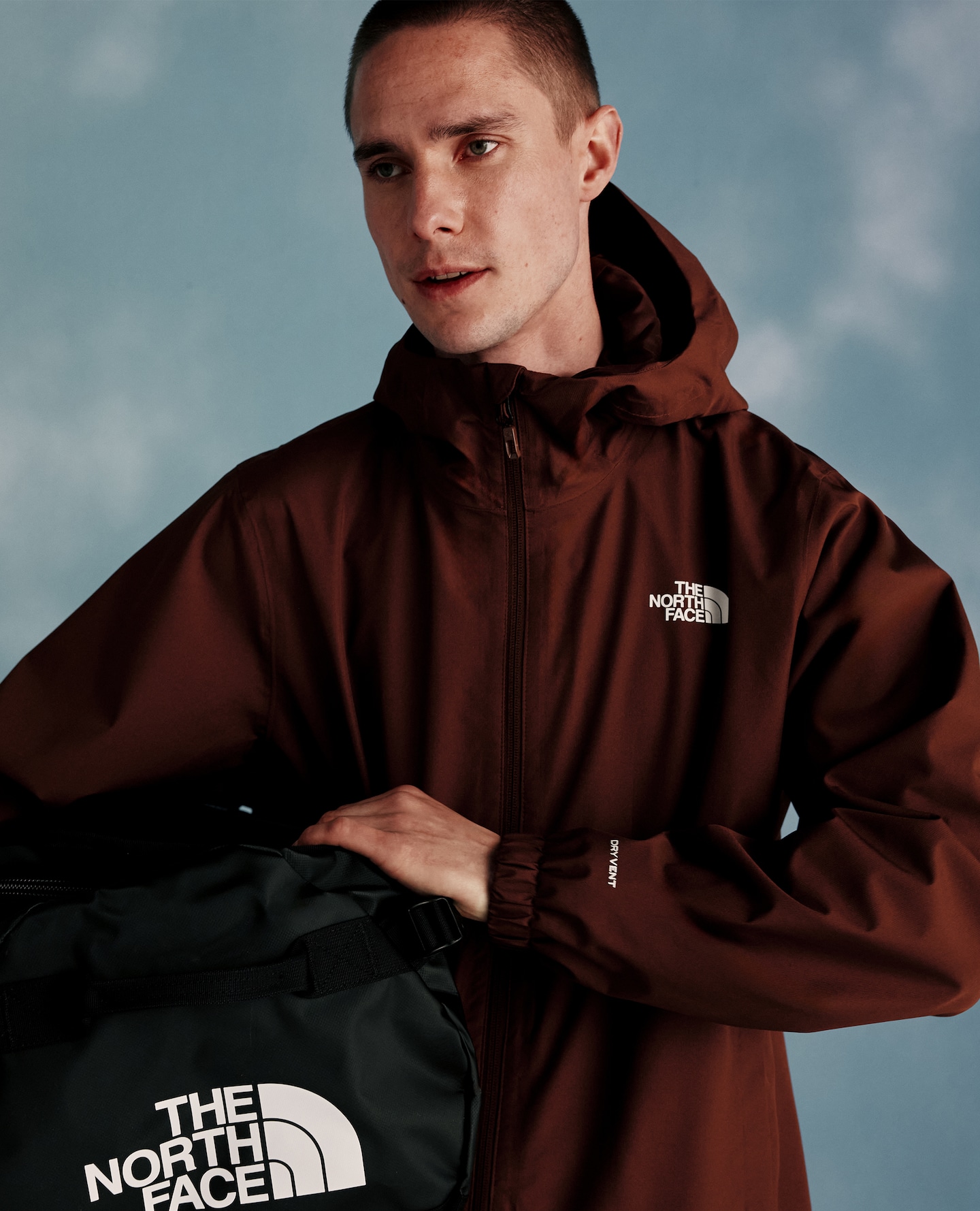 Model wears jacket in dark red from The North Face