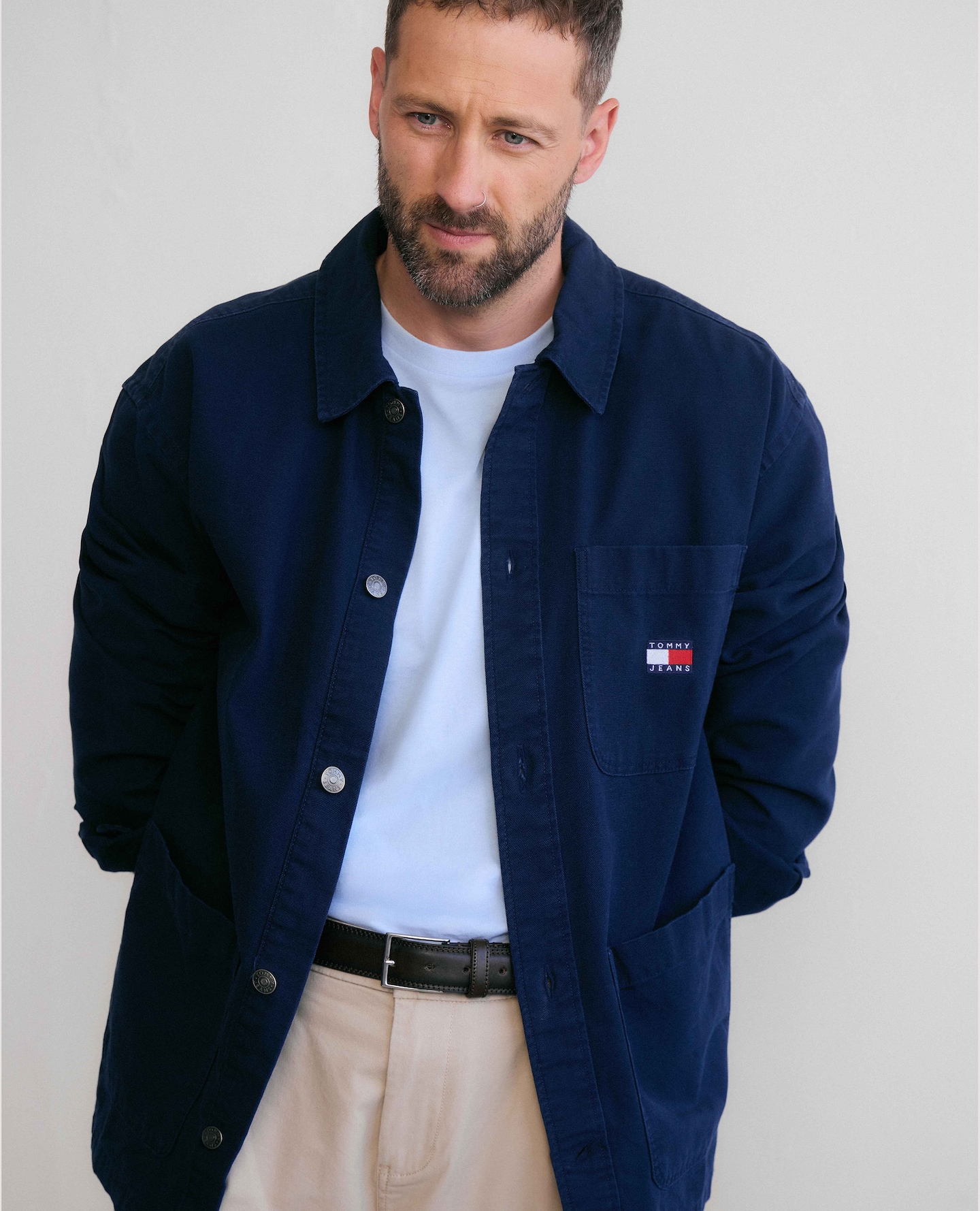 Model wears Tommy Hilfiger Overshirt with Tommy Hilfiger Short Sleeve Script Stack T-Shirt - Blue
