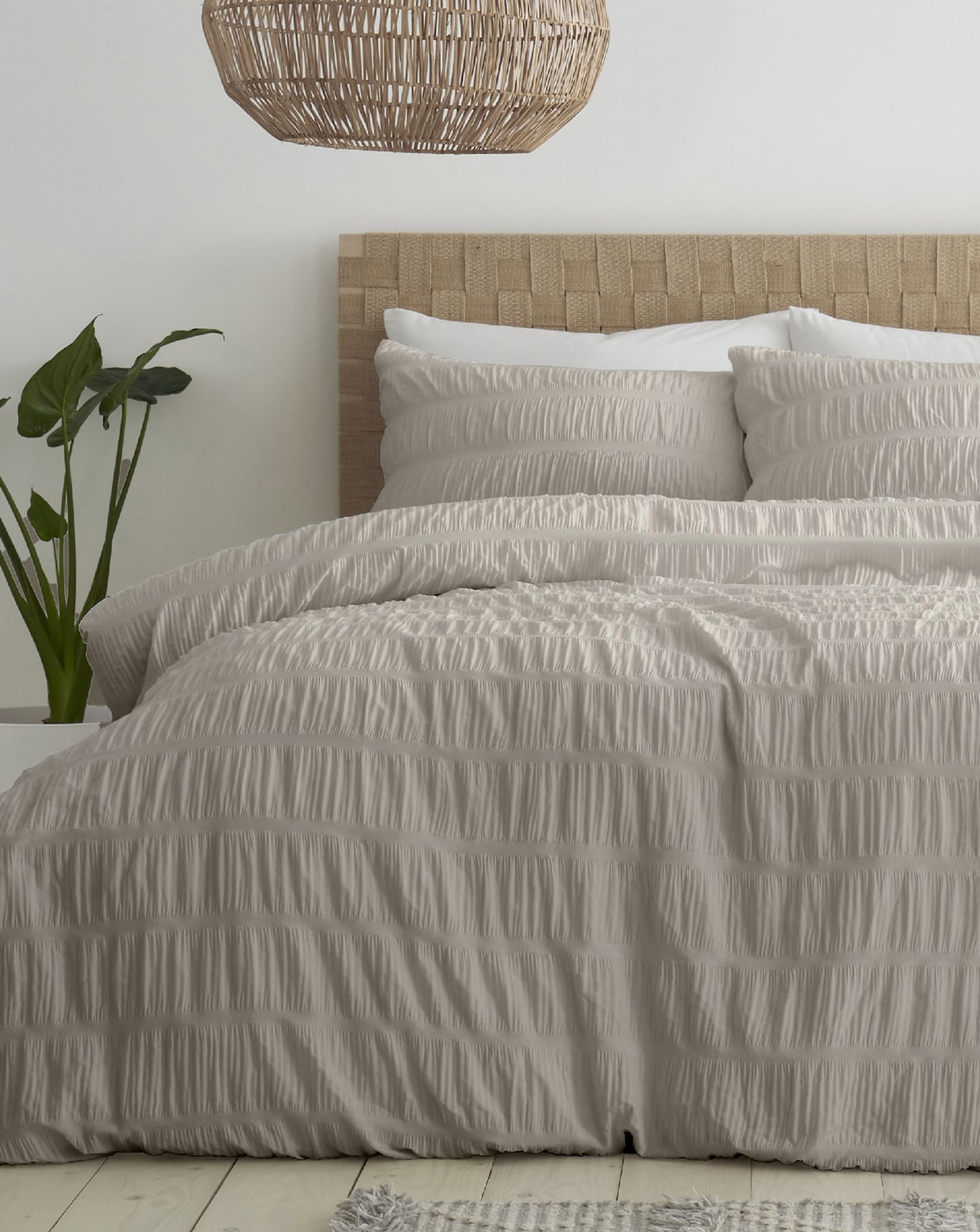 Catherine Lansfield Seersucker Duvet Cover Set is pictured.
