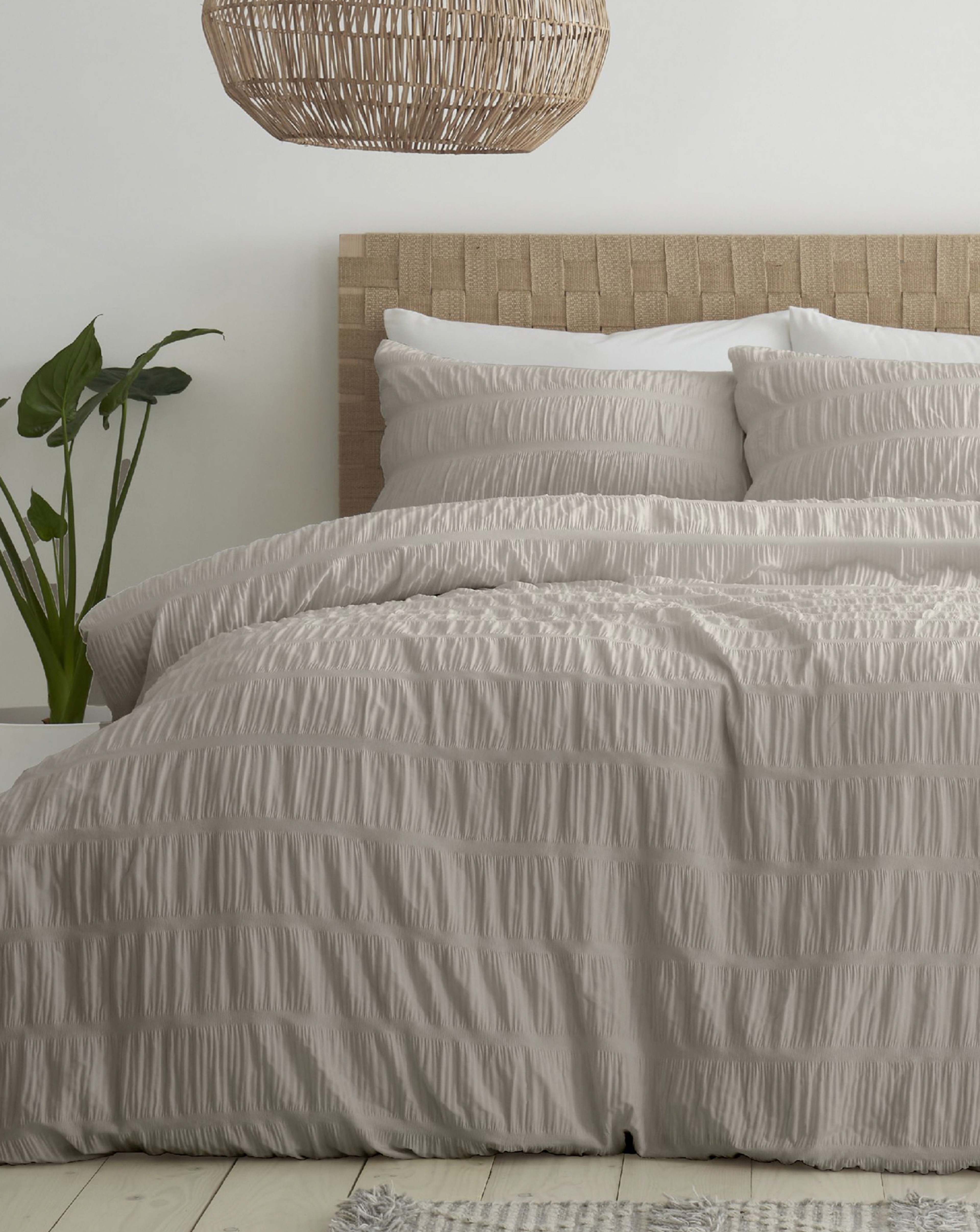 Catherine Lansfield Seersucker Duvet Cover Set is pictured.