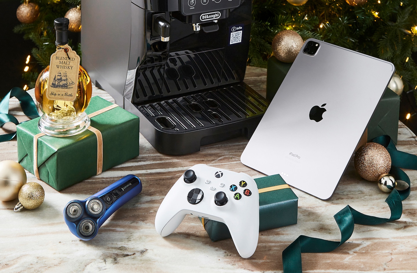 Christmas gifts are pictured including Xbox controller, DelOnghi Coffee machine and Ipad