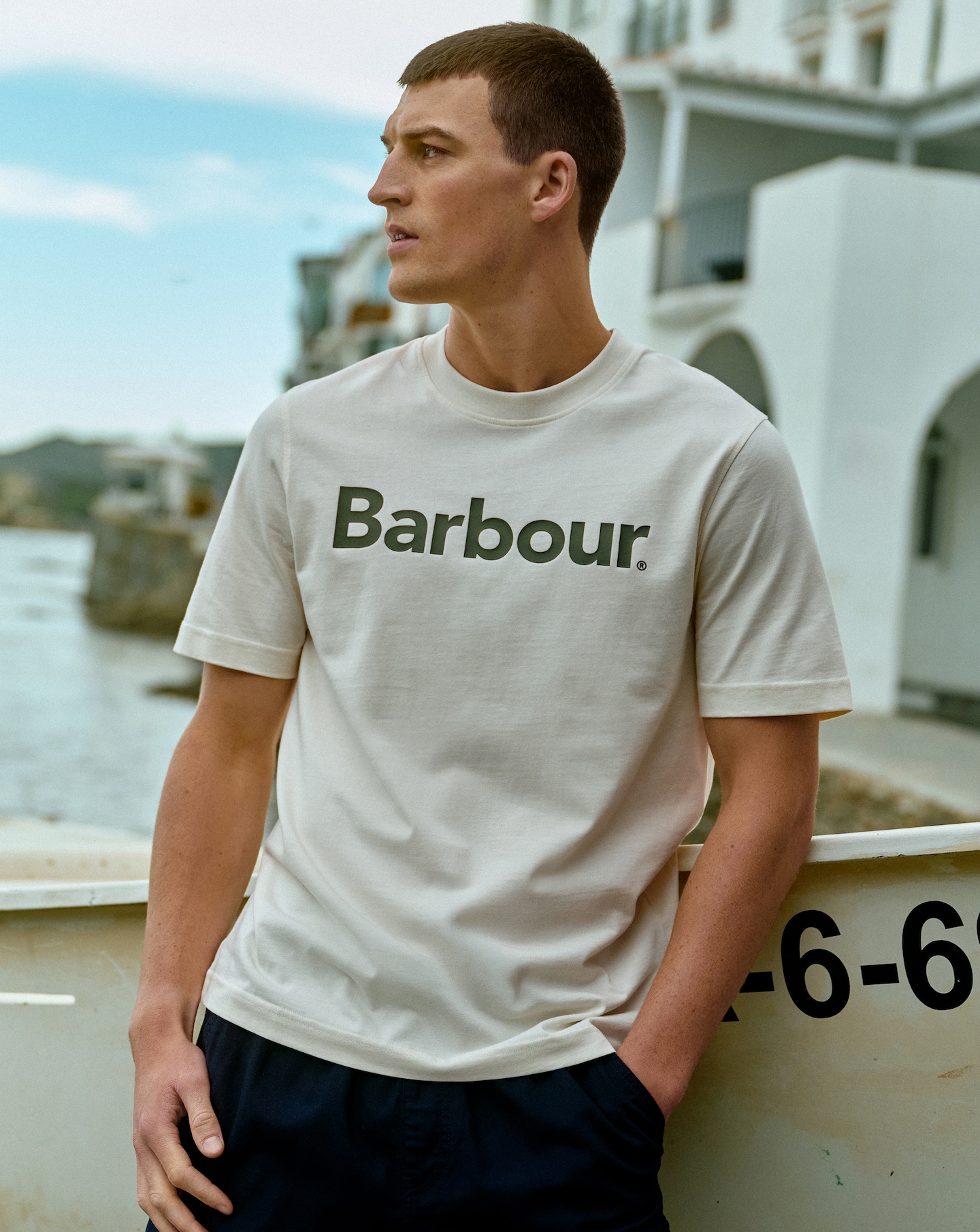 Model wears Barbour Short Sleeve Logo Relaxed T-Shirt - White