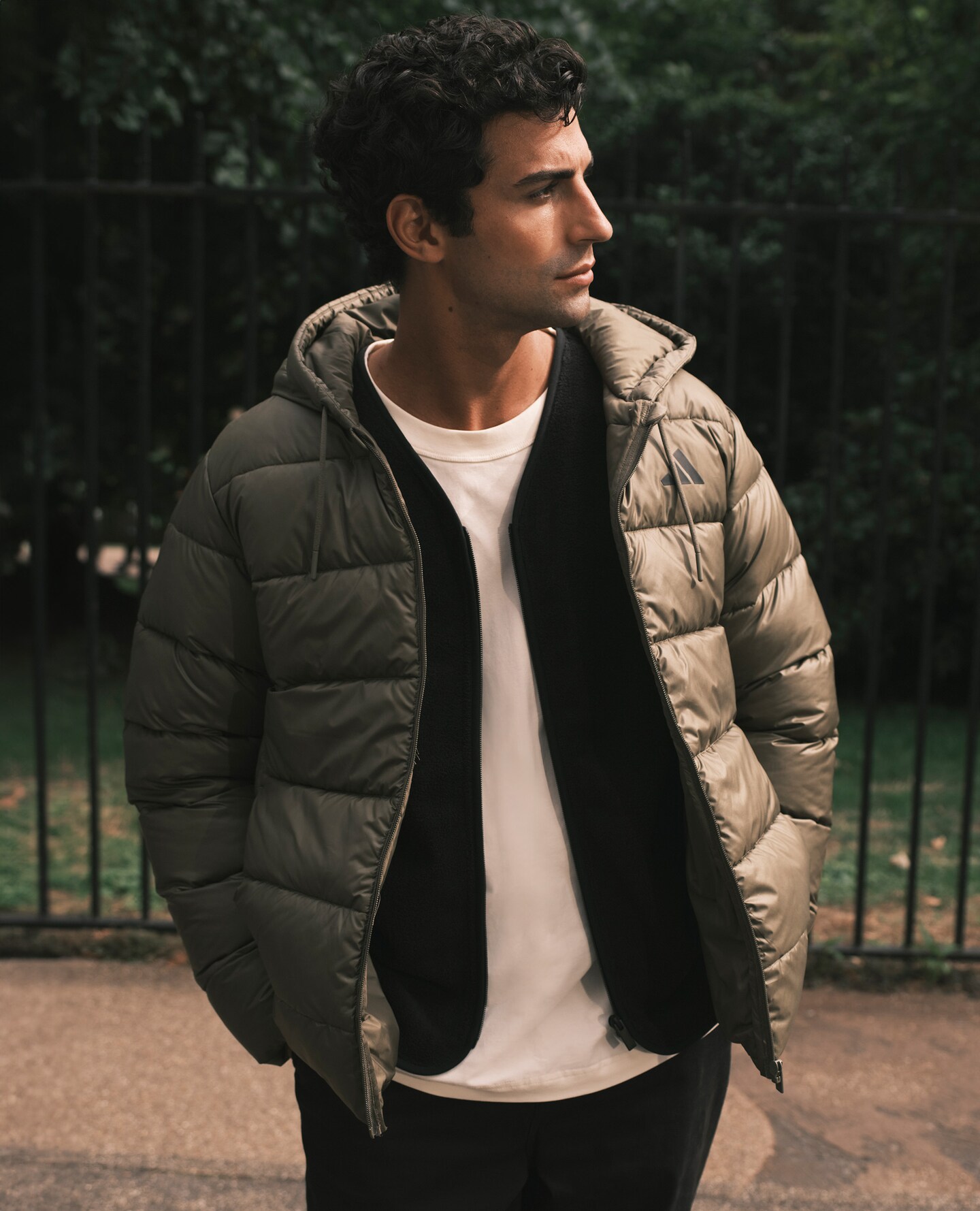 Model wearing khaki adidas parka 