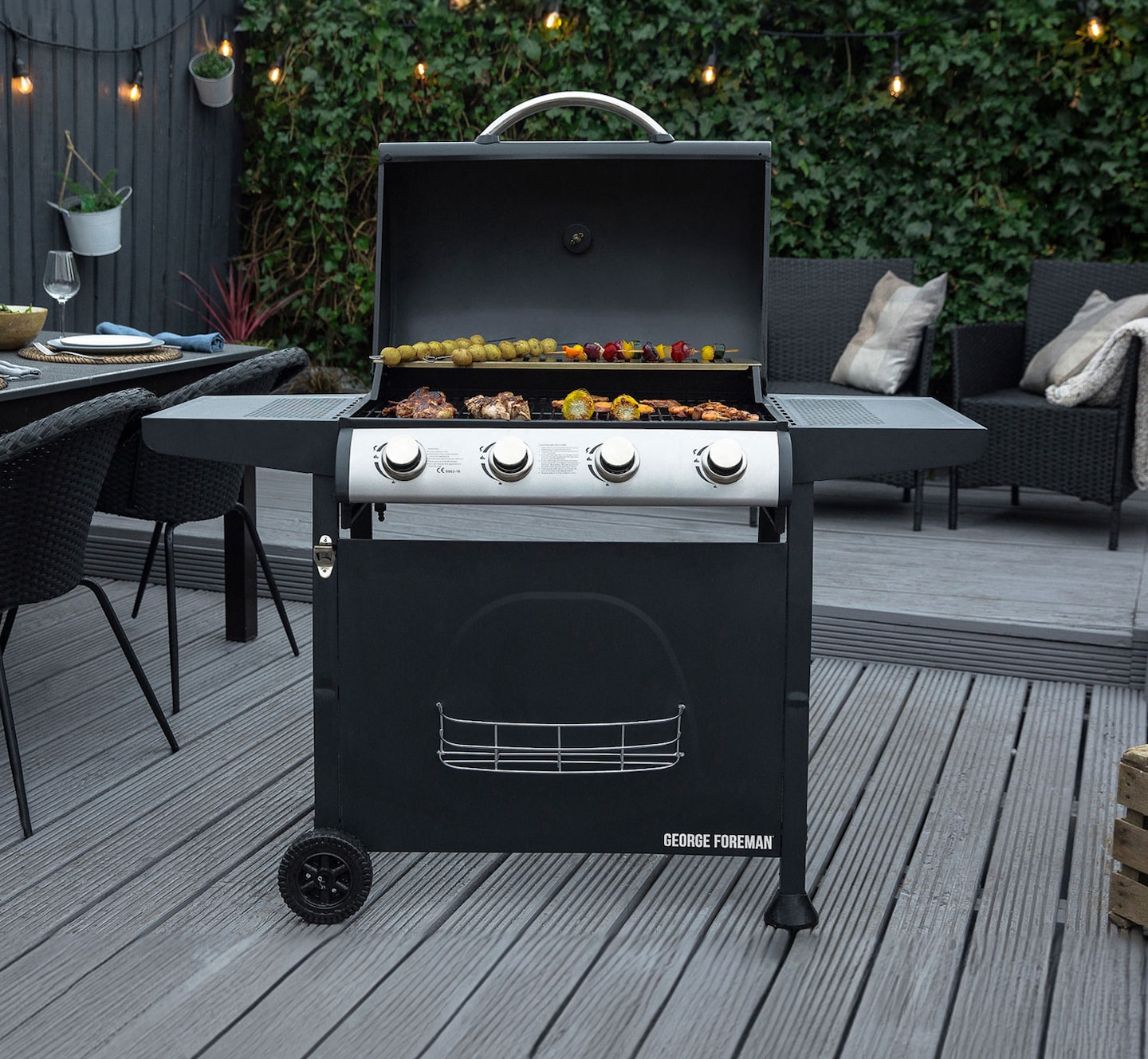 George Foreman BBQ grill in a garden.