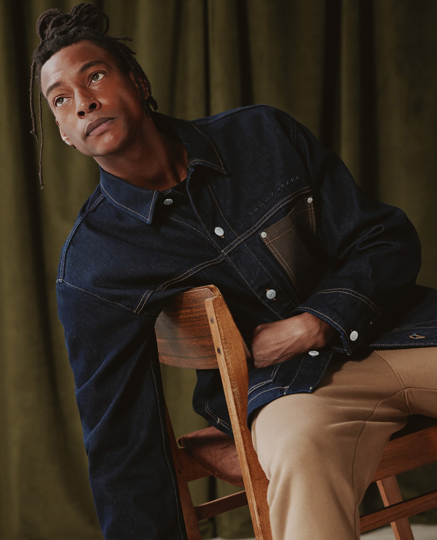 Model wears Tommy Jeans Chore Jacket - Dark Denim