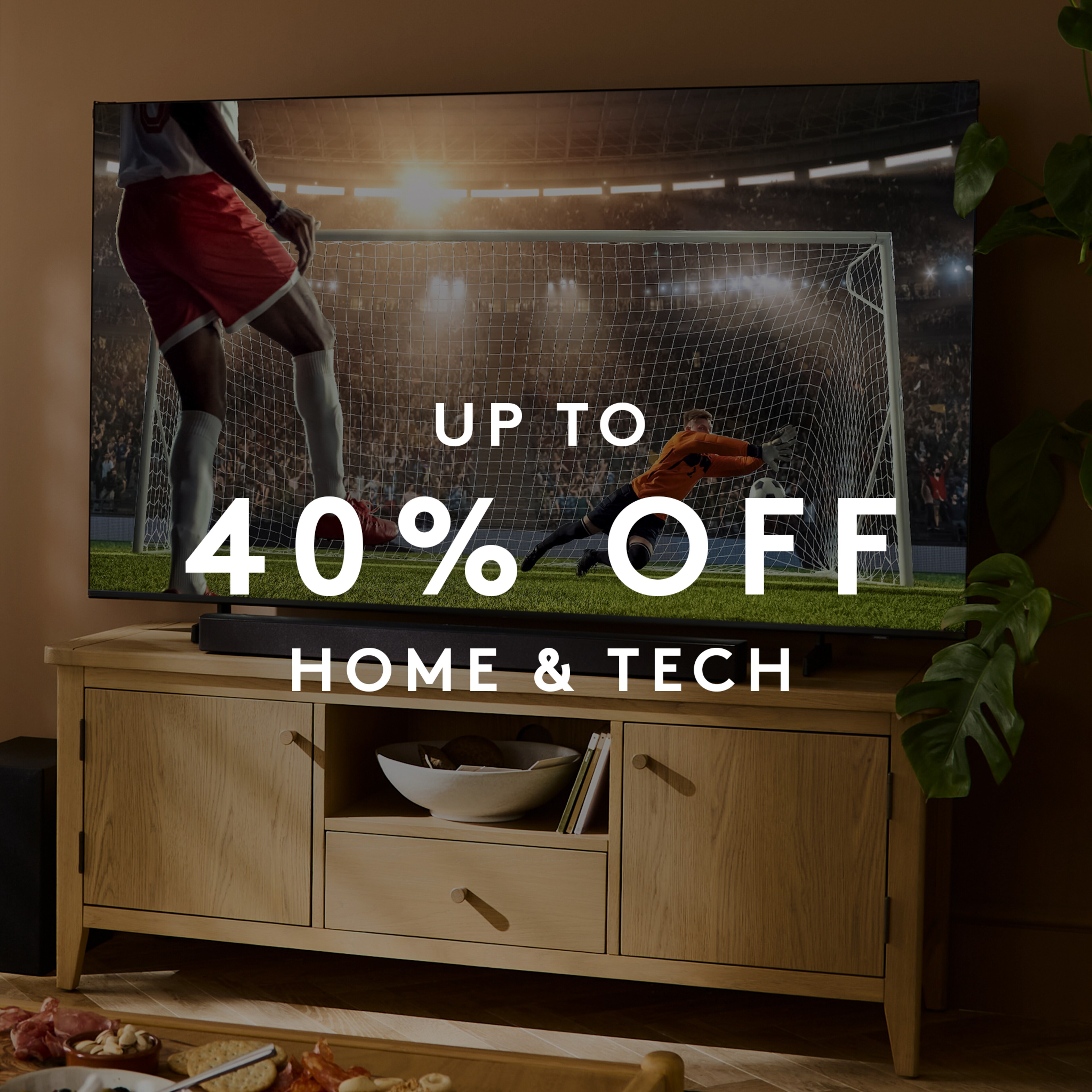 Up to 40% OFF Home & Tech. Hisense TV is pictured with Caitlin Ready Assembled Wooden TV Unit and Samsung HW-B46CF/XU 2.1ch Soundbar with Wireless Subwoofer, DTS Virtual:X