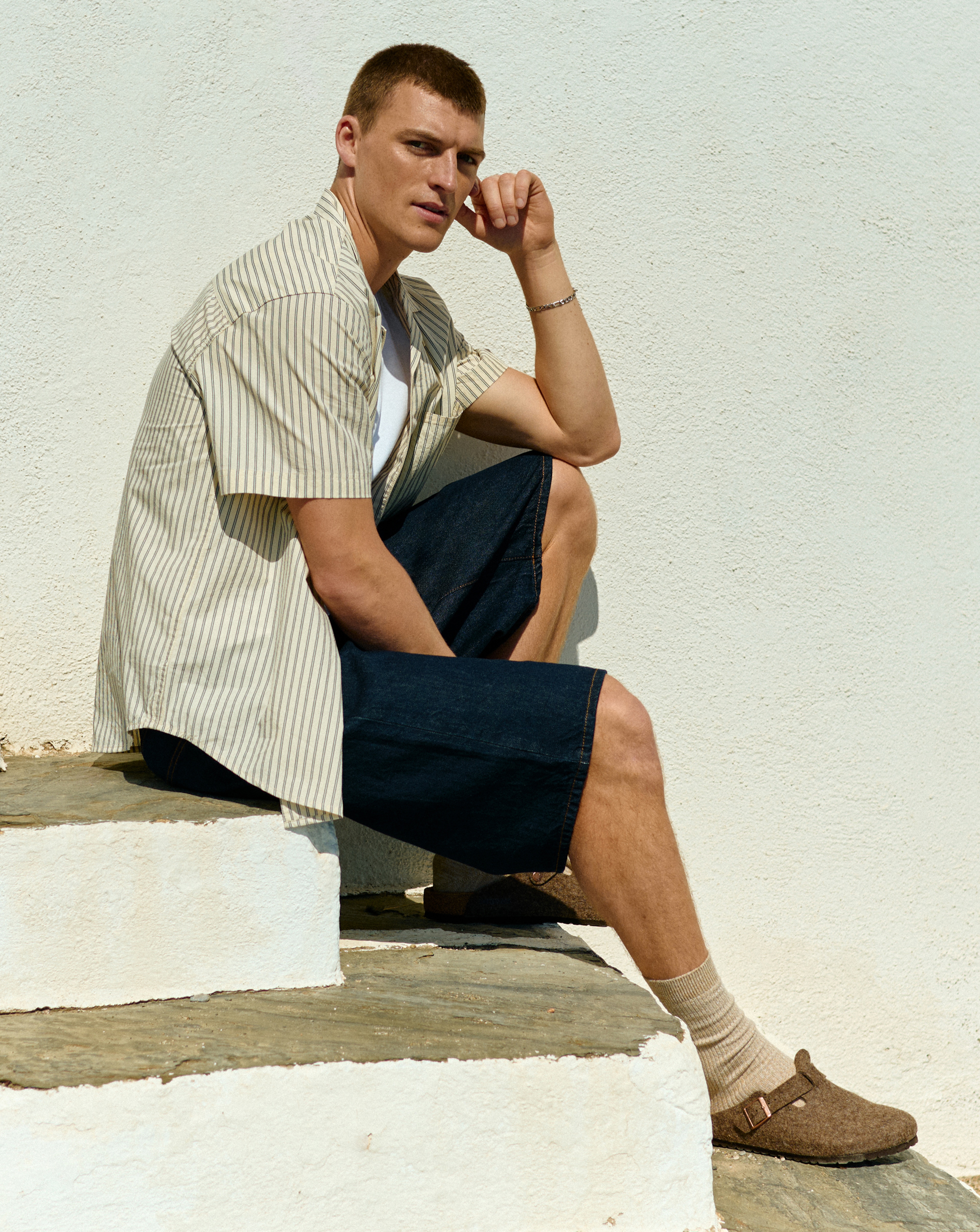 Model wears Only & Sons Carl Loose Denim Shorts - Blue