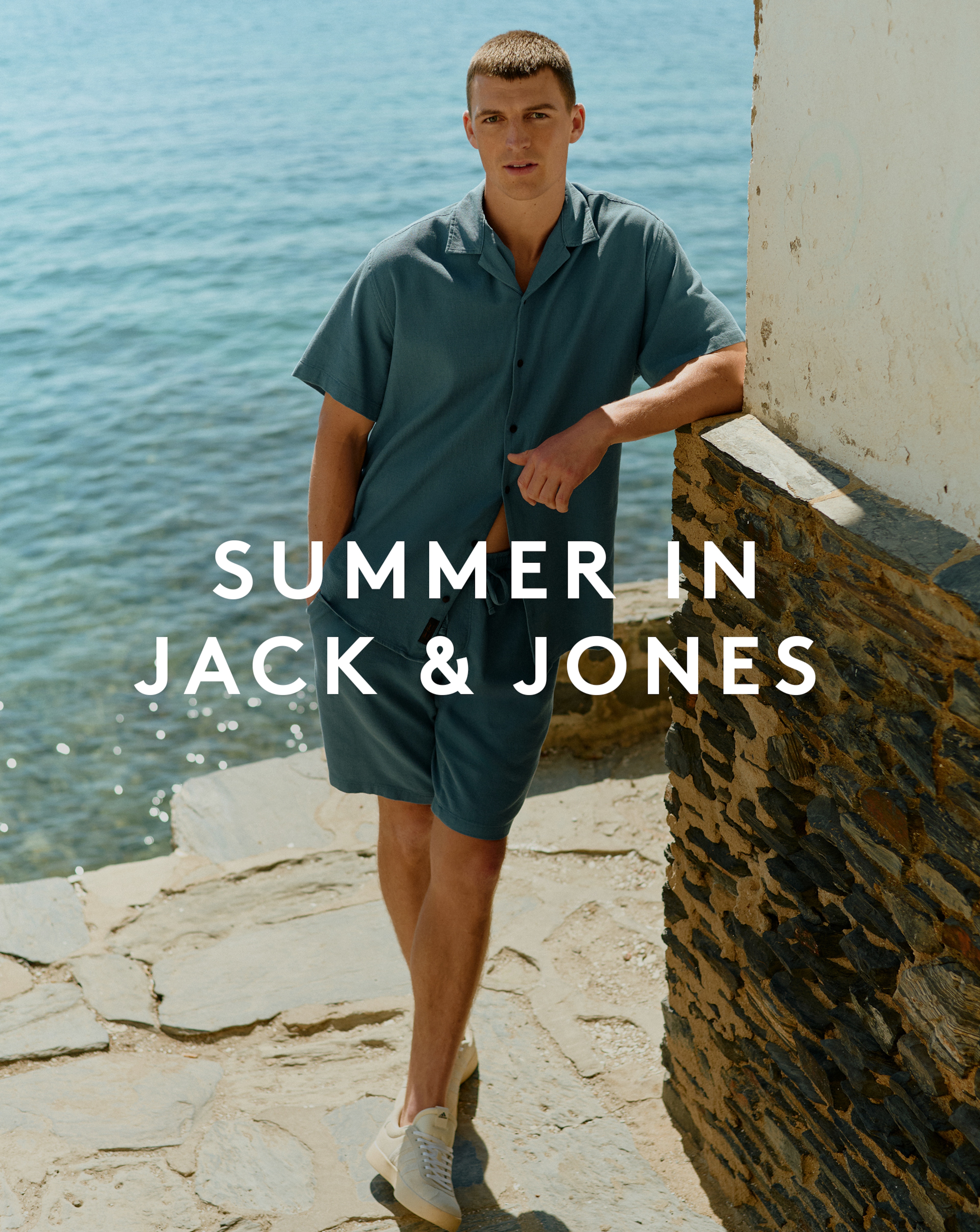 Summer in Jack & Jones. Model wears Jack & Jones Global Waffle Resort Shirt and Short Set.