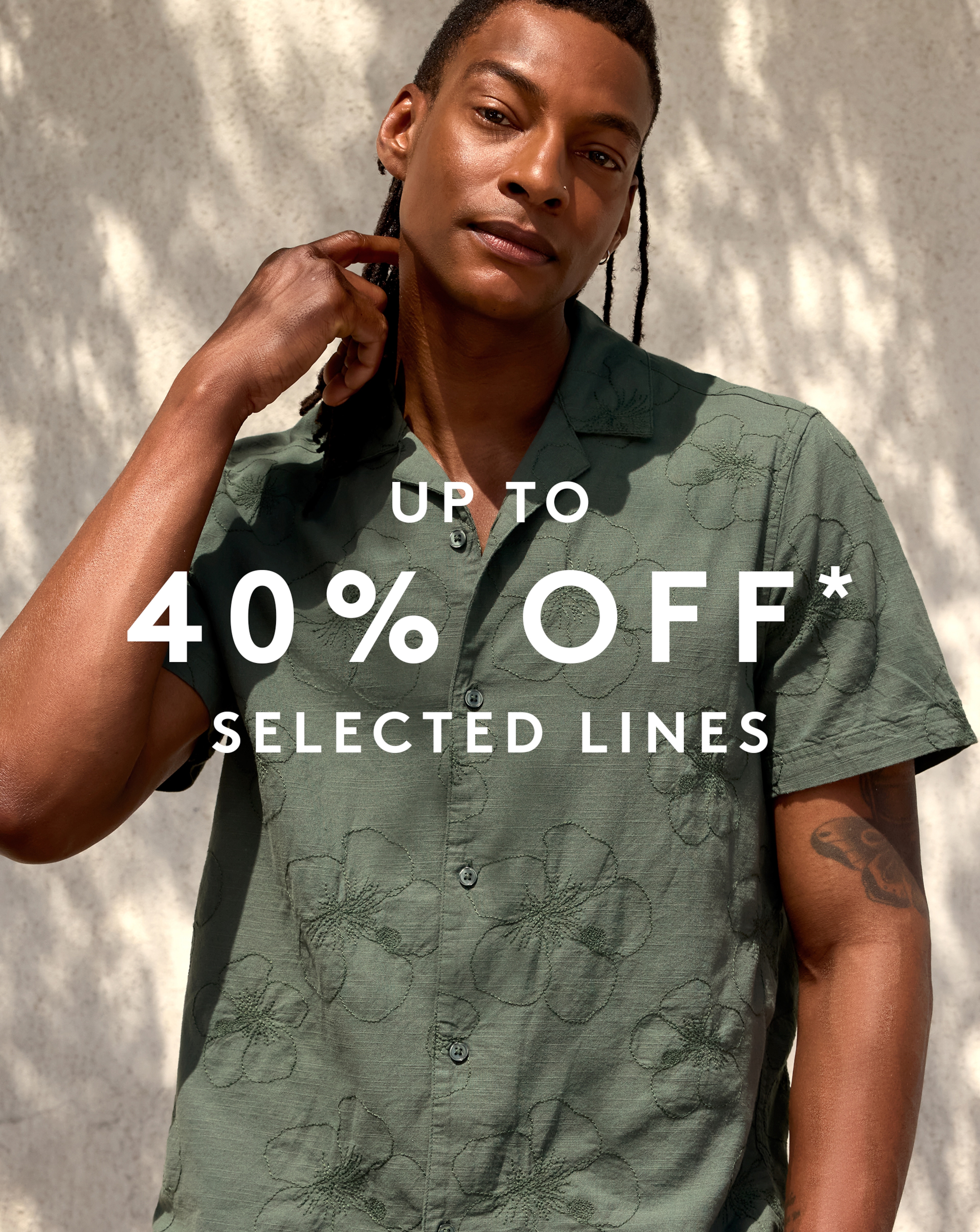 Up to 40% Off* Selected lines. Model wears Revere Collar Floral Embroidered Co-ord Shirt
