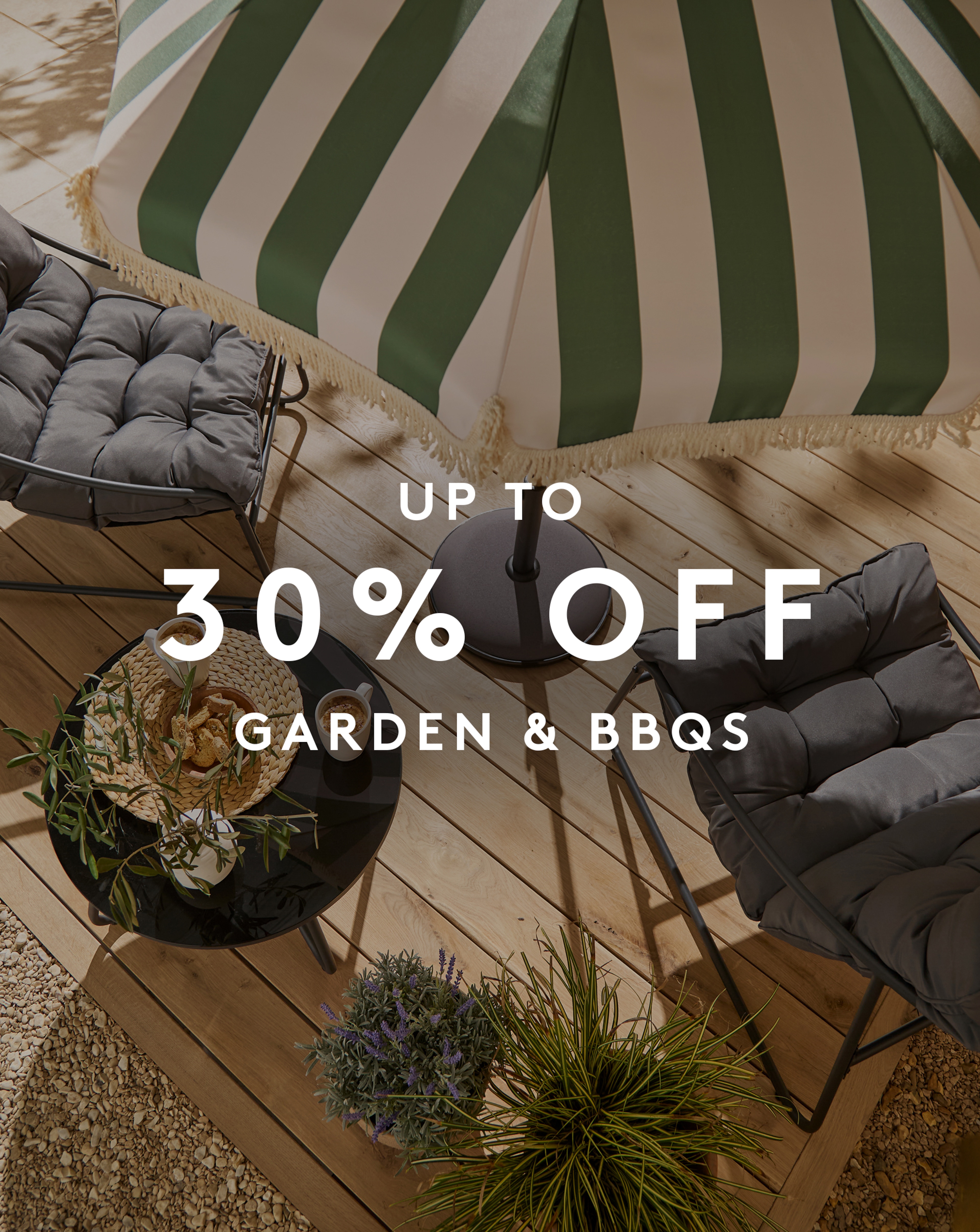 Up to 30% off Garden & BBQs. Grey padded garden chairs with Stripe Parasol pictured.