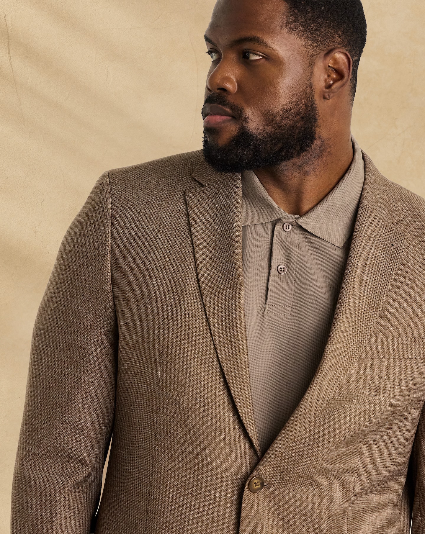 Modle wears Tailored Single Breasted Blazer in Brown