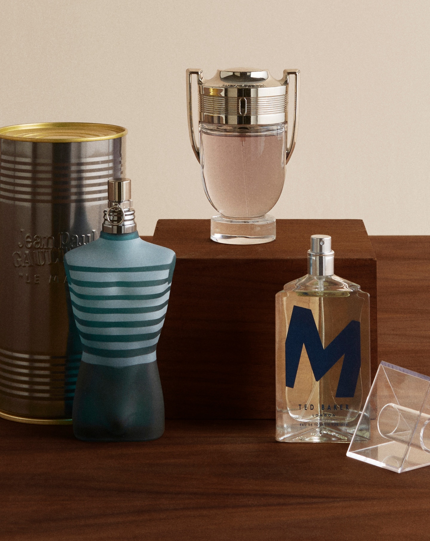close up on various bottles of men's fragrances