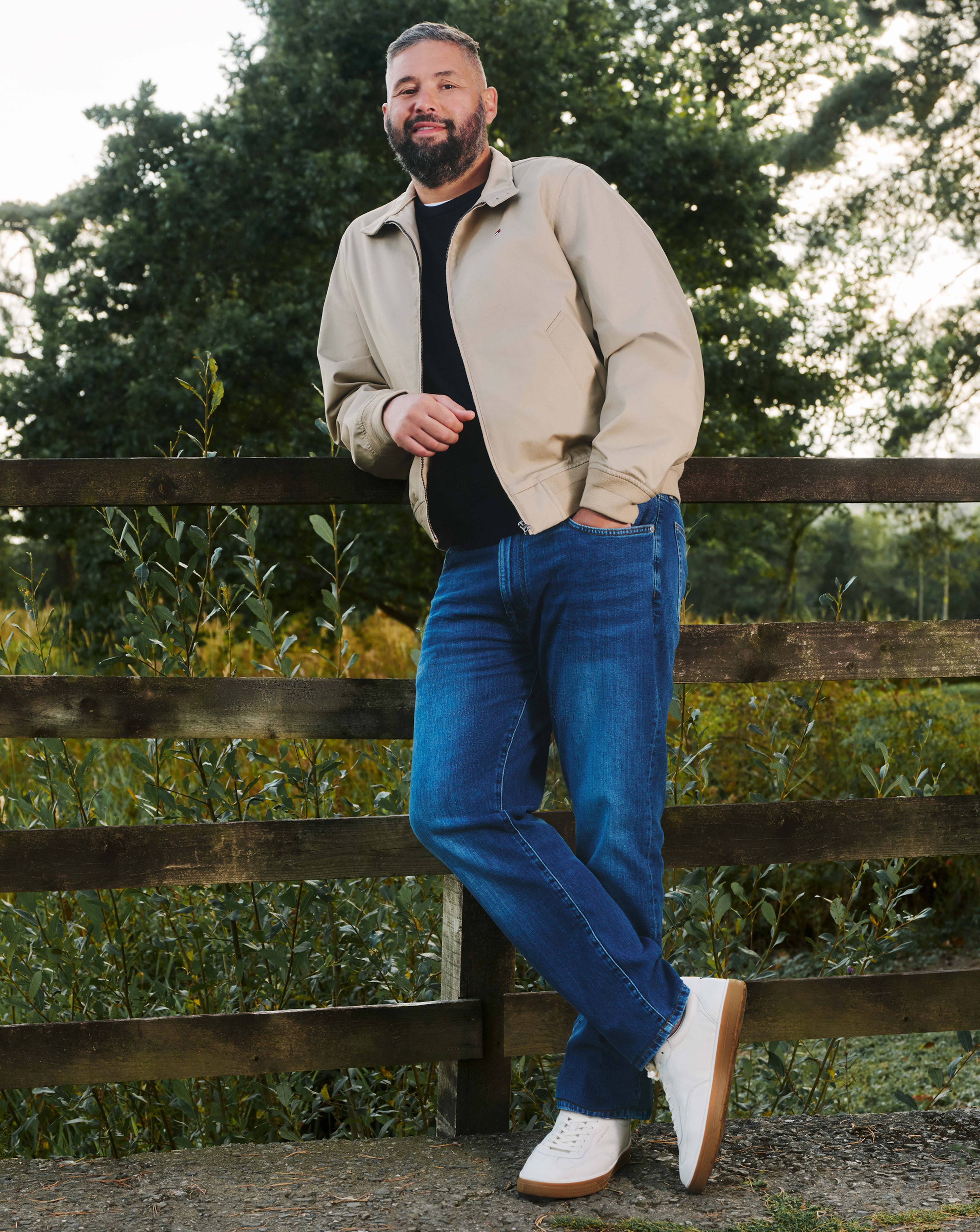 Tony Bellew wears Tommy Hilfiger Classic Harrington Jacket - Beige with Tommy Hilfiger Jeans