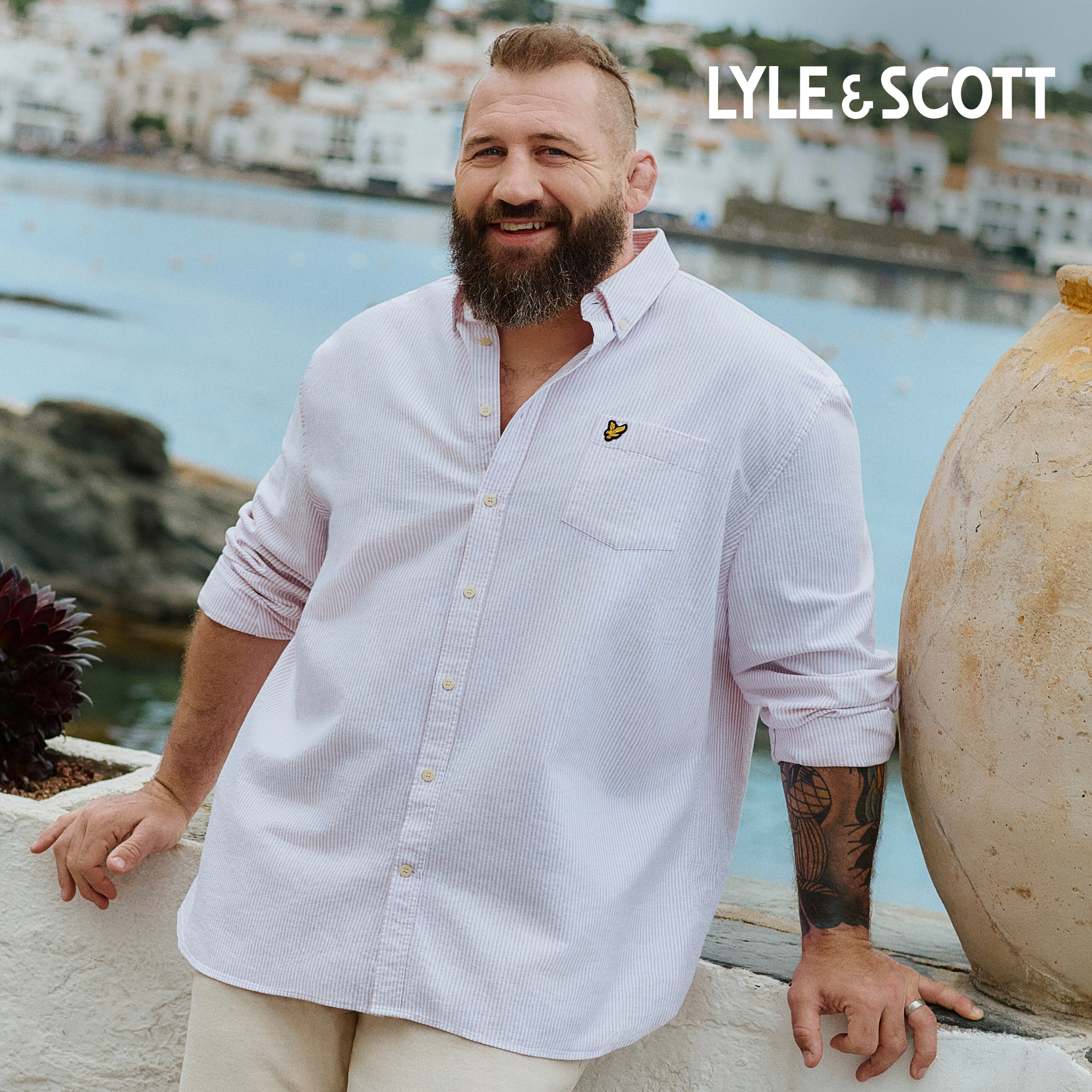 Joe Marler wears Lyle & Scott Stripe Oxford Shirt - Pink/White in holiday location