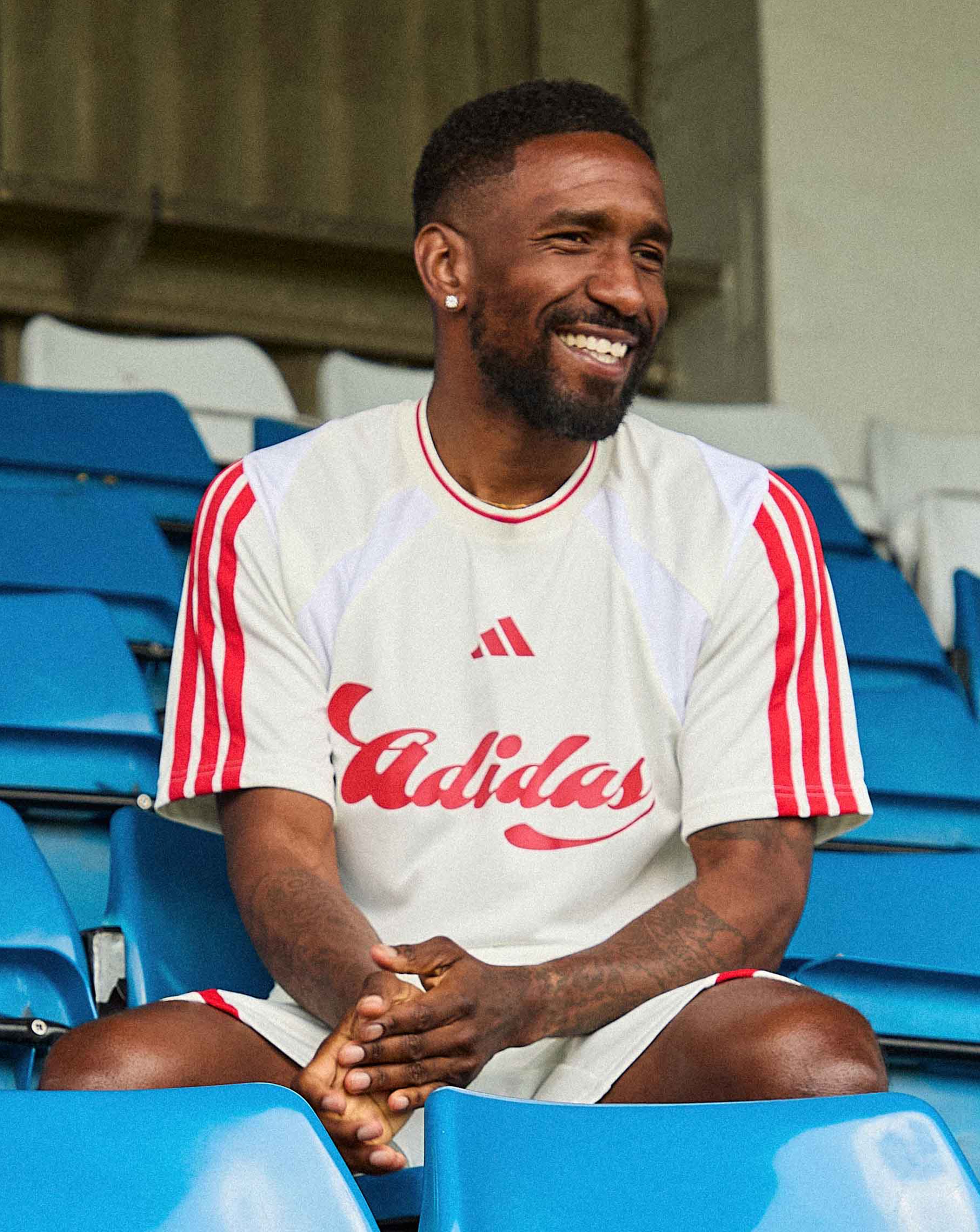 Jermaine Defoe sat in football stadium wears adidas Tiro T-Shirt and Shorts