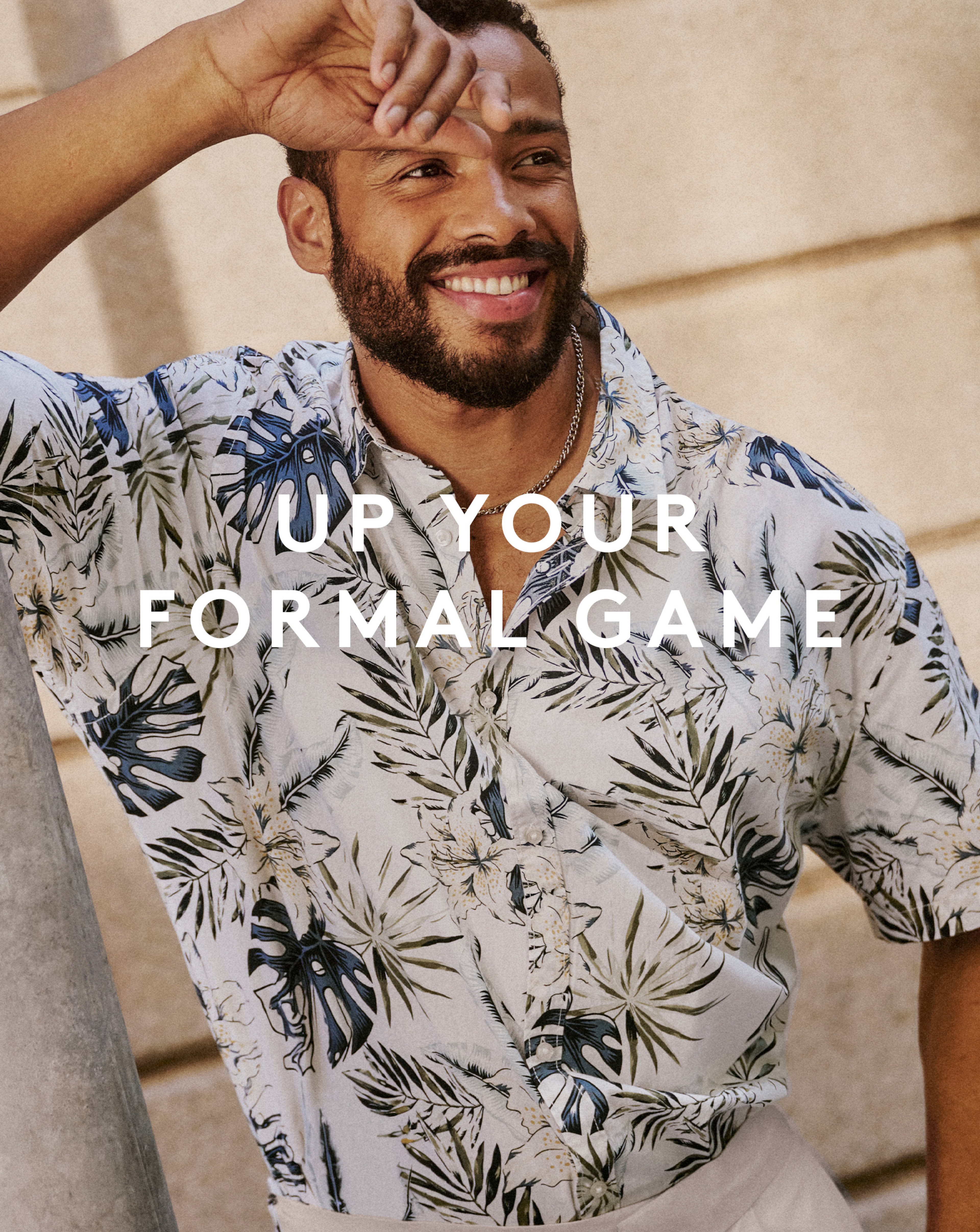 Model wearing floral print shirt