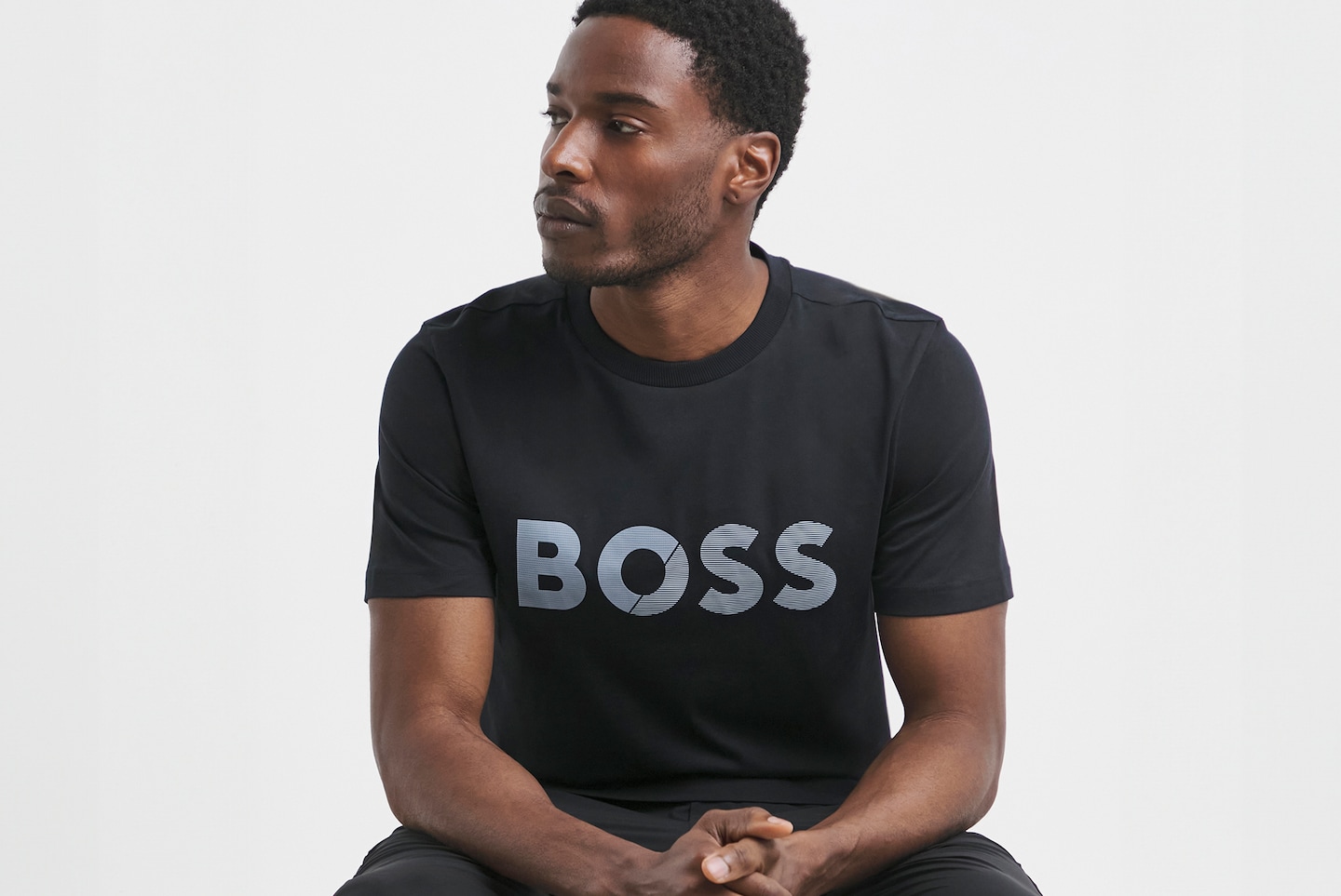 Model wears BOSS Short Sleeve Tape Logo T-Shirt - Dark Blue