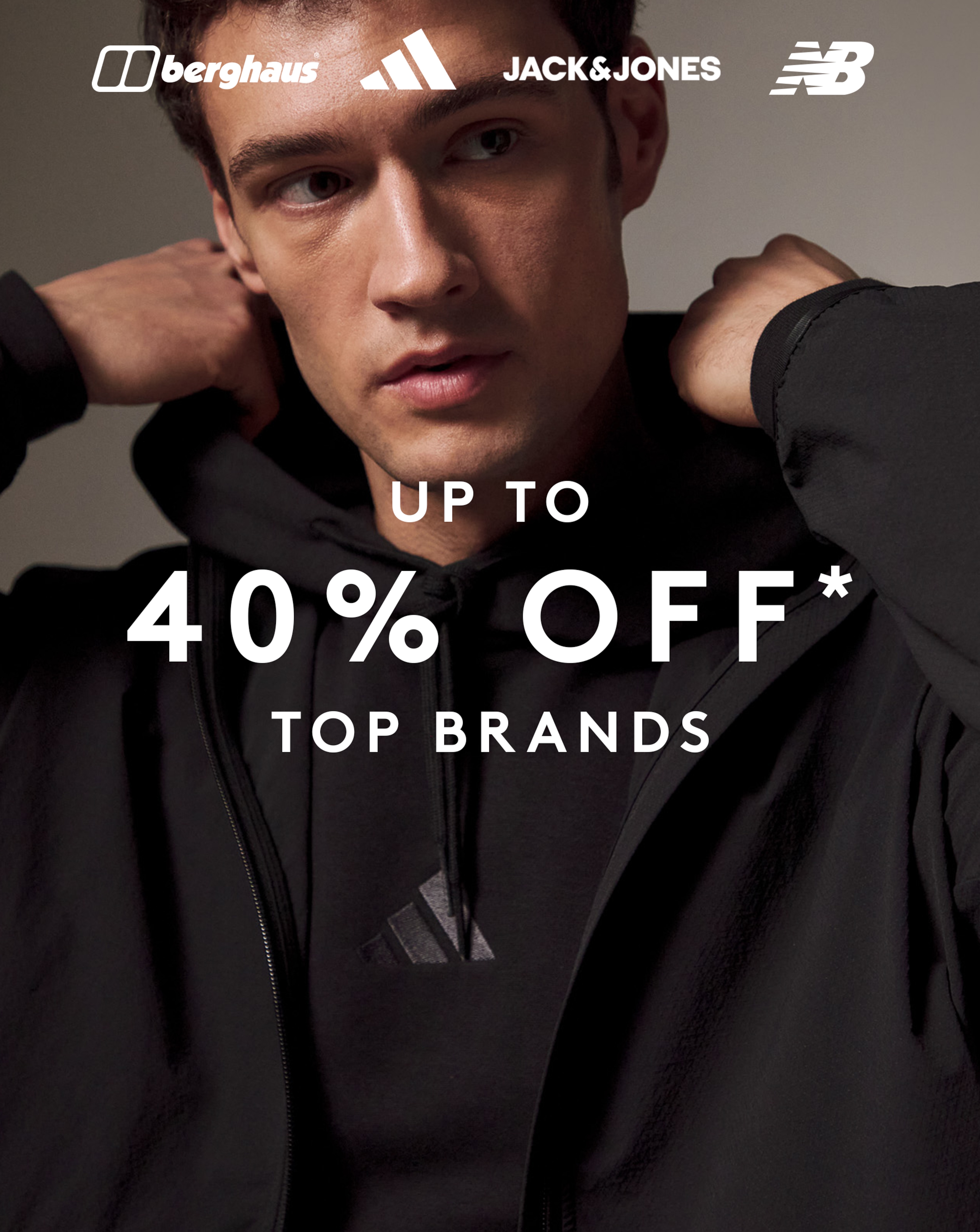 Up to 40% off* Top Brands. Model wears Black adidas hoodie