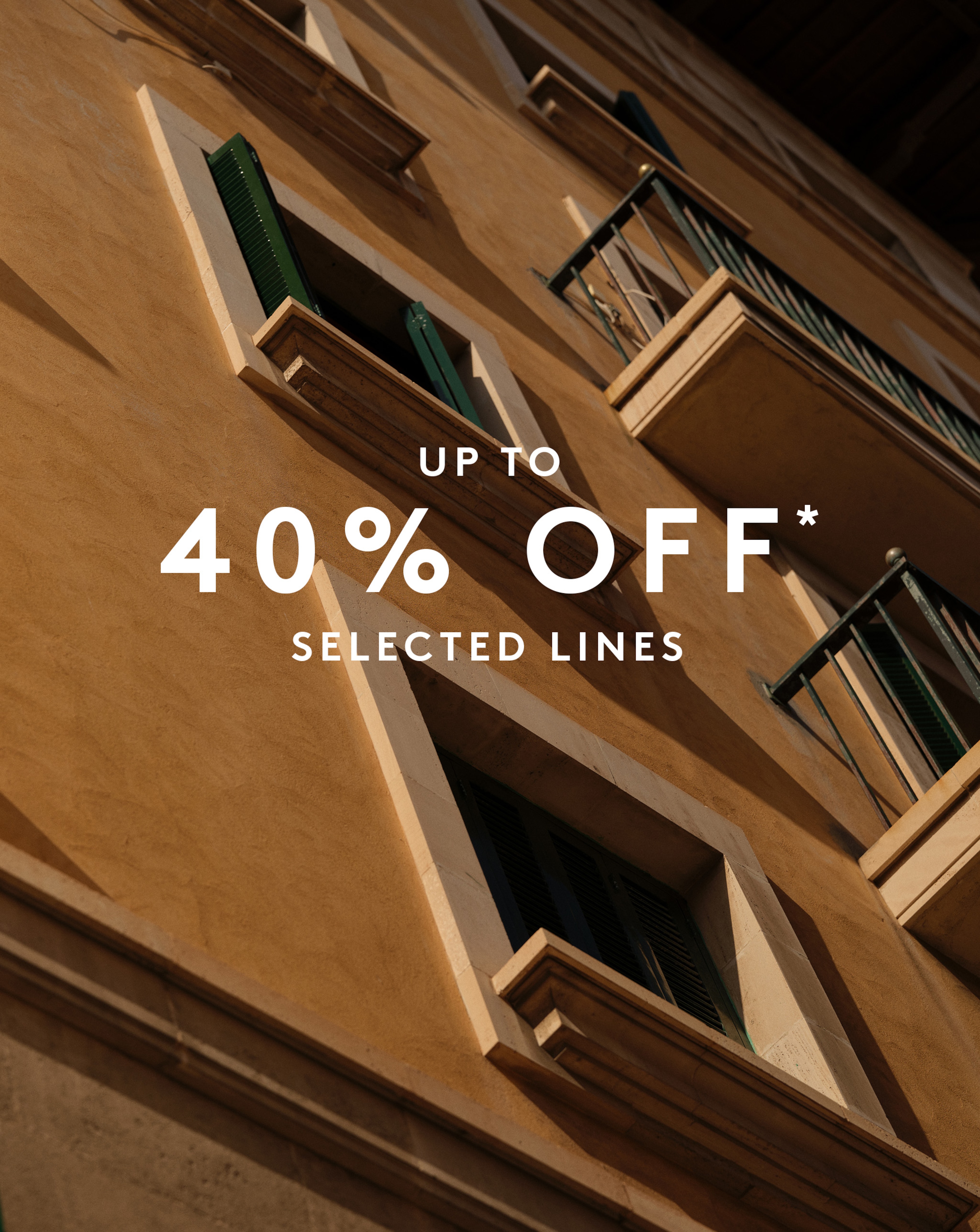 Close up image of a European Building with 40% off message overlayed