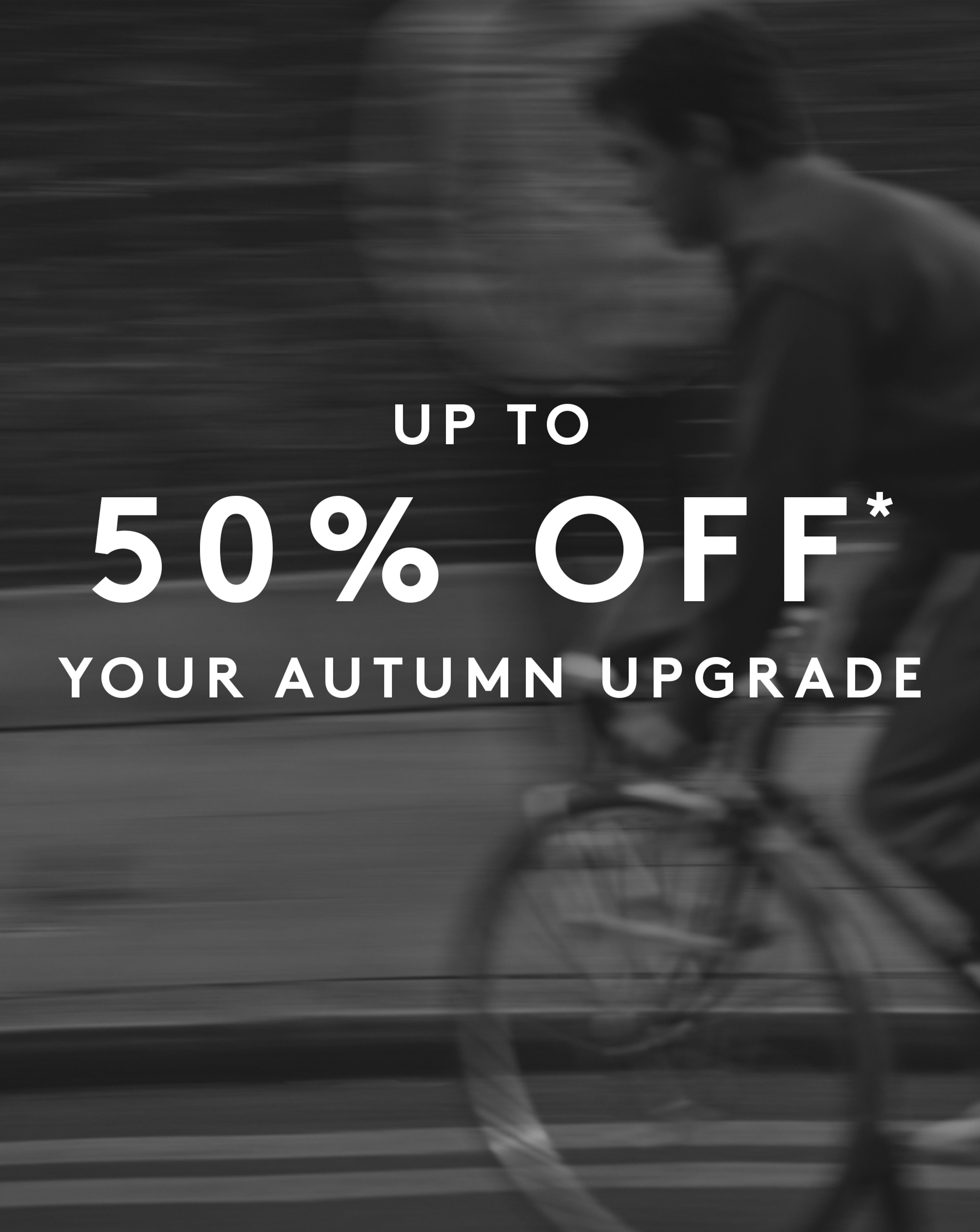 Up to 50% Off* Your Winter Wardrobe. Model rides a bike in the background