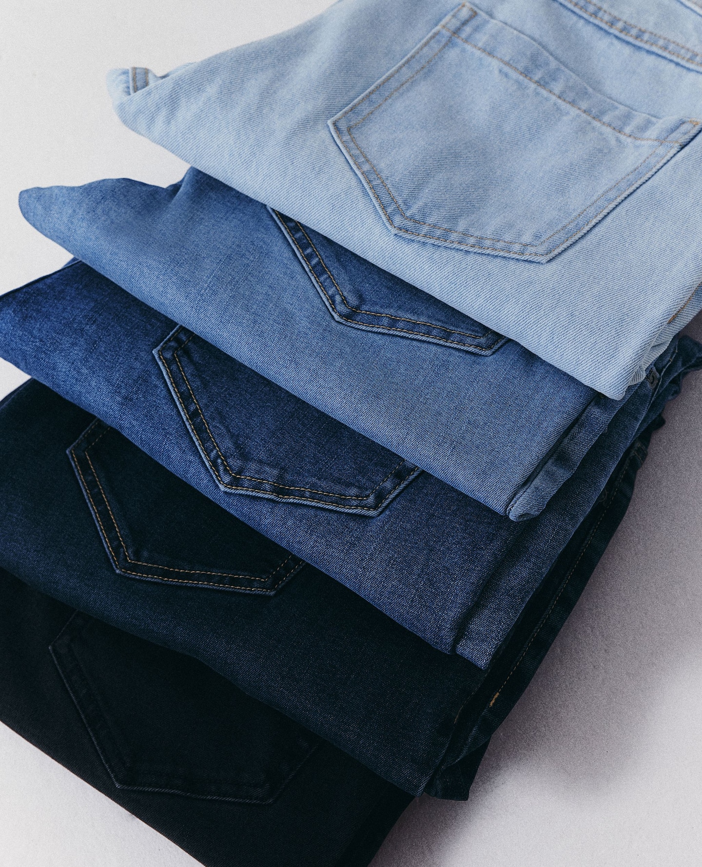 Jeans arranged in a row