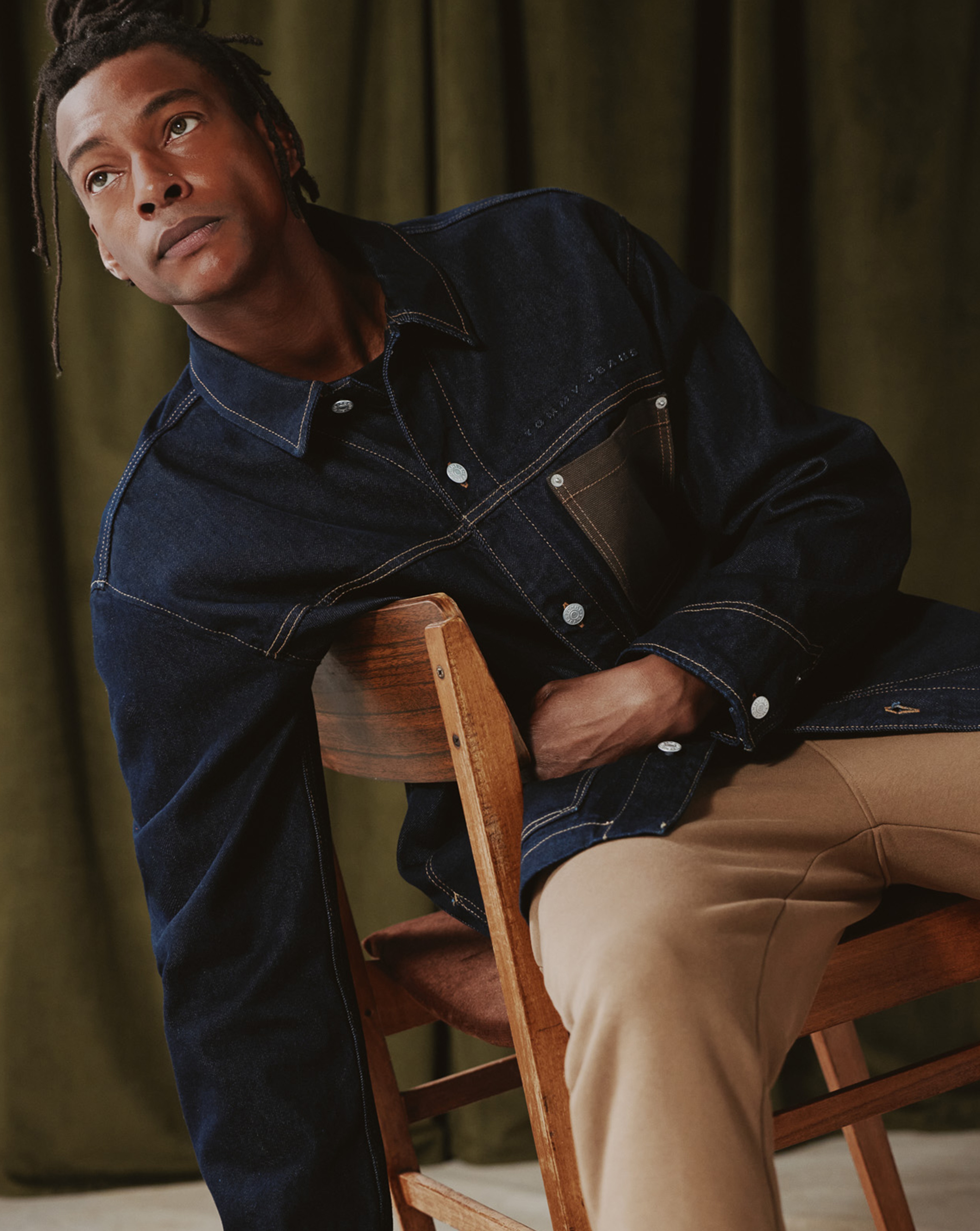 Model wears Tommy Jeans Chore Jacket - Dark Denim