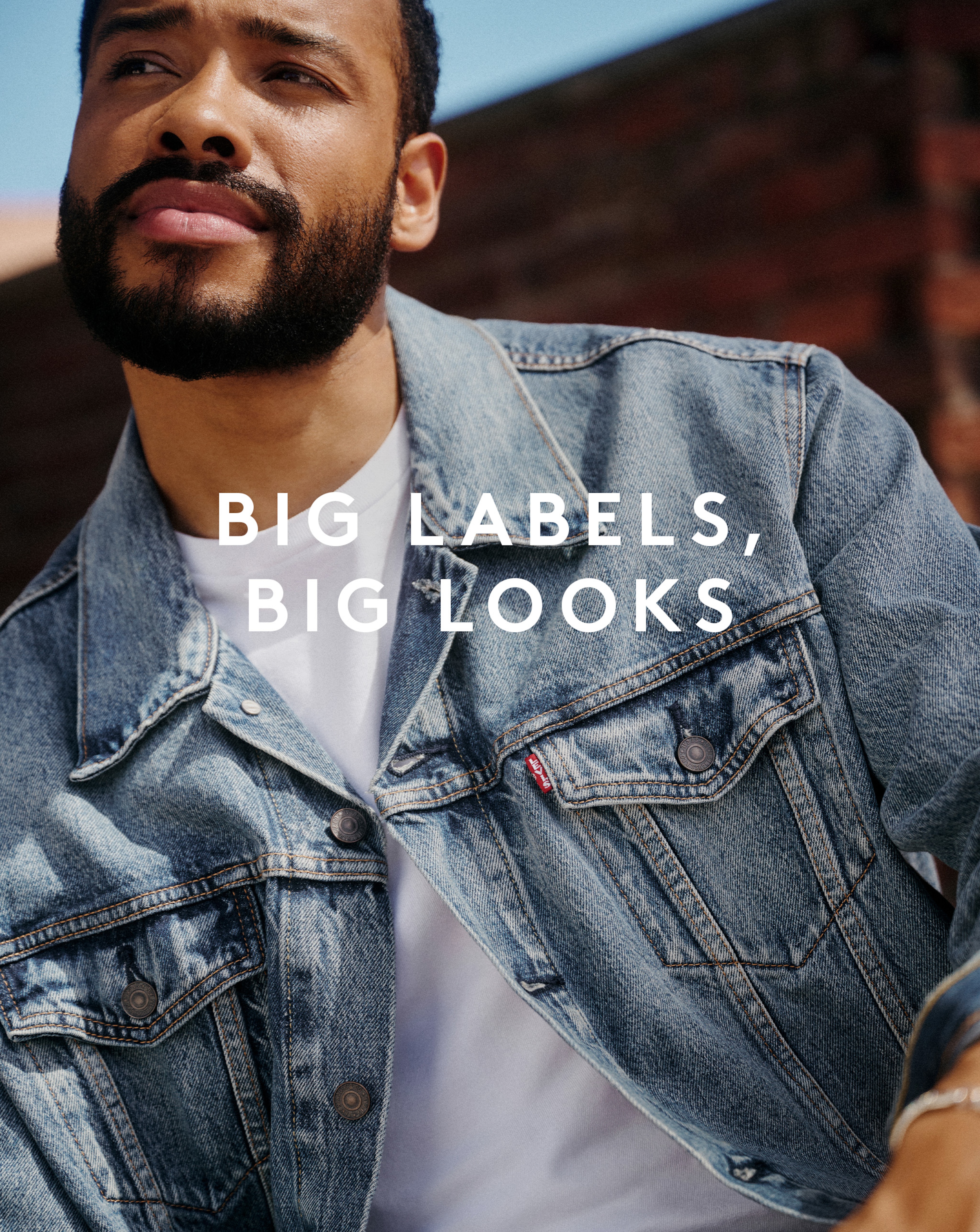 Model wearing denim Levi's jacket