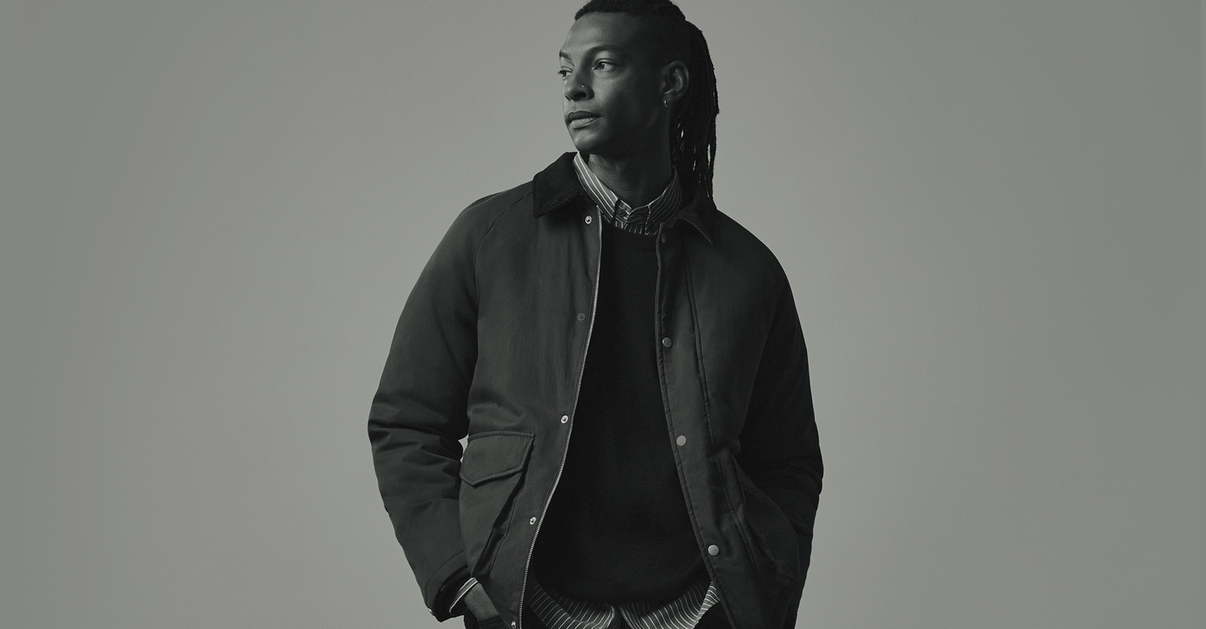 Black Friday Warm Up. Model wears Cord Collar Wadded Jacket with striped shirt and Crew Neck Black Acrylic Knitted Jumper