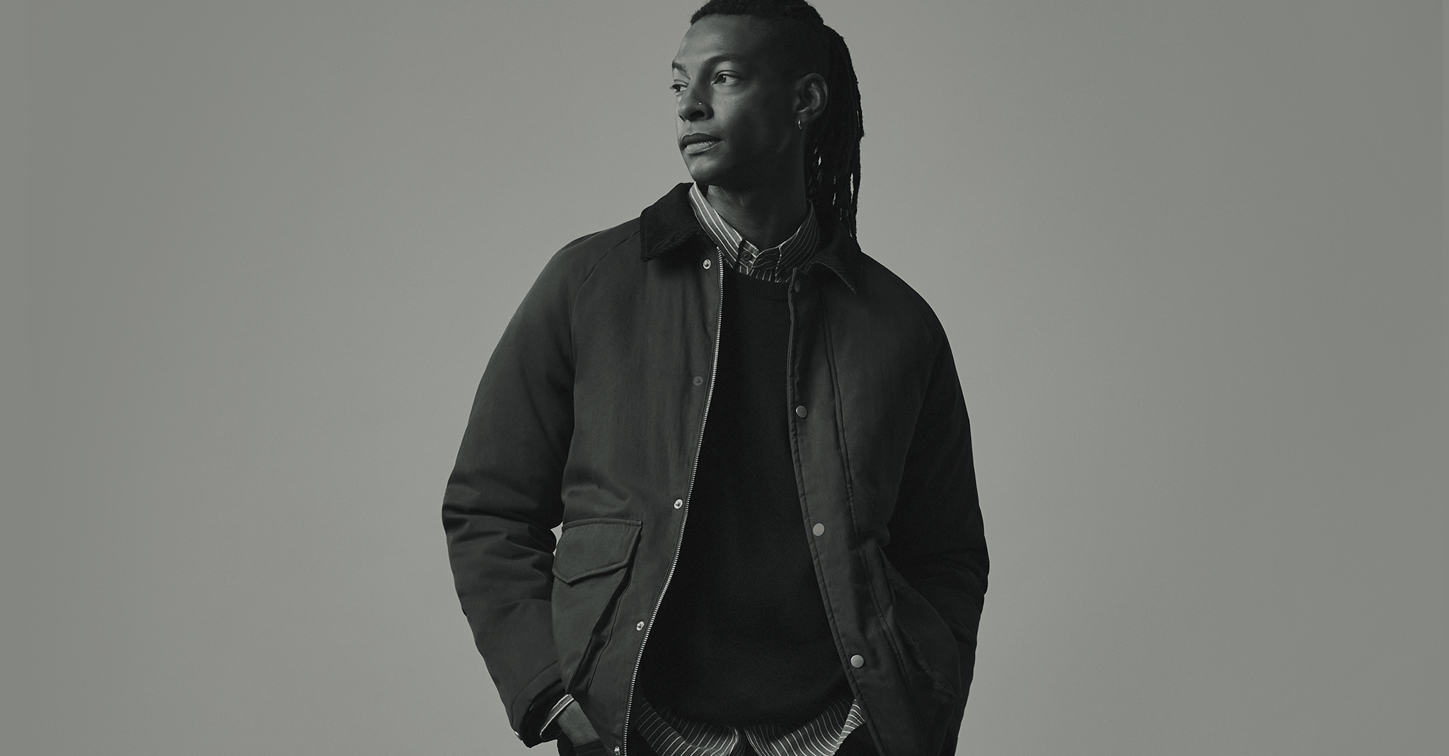 Black Friday Warm Up. Model wears Cord Collar Wadded Jacket with striped shirt and Crew Neck Black Acrylic Knitted Jumper