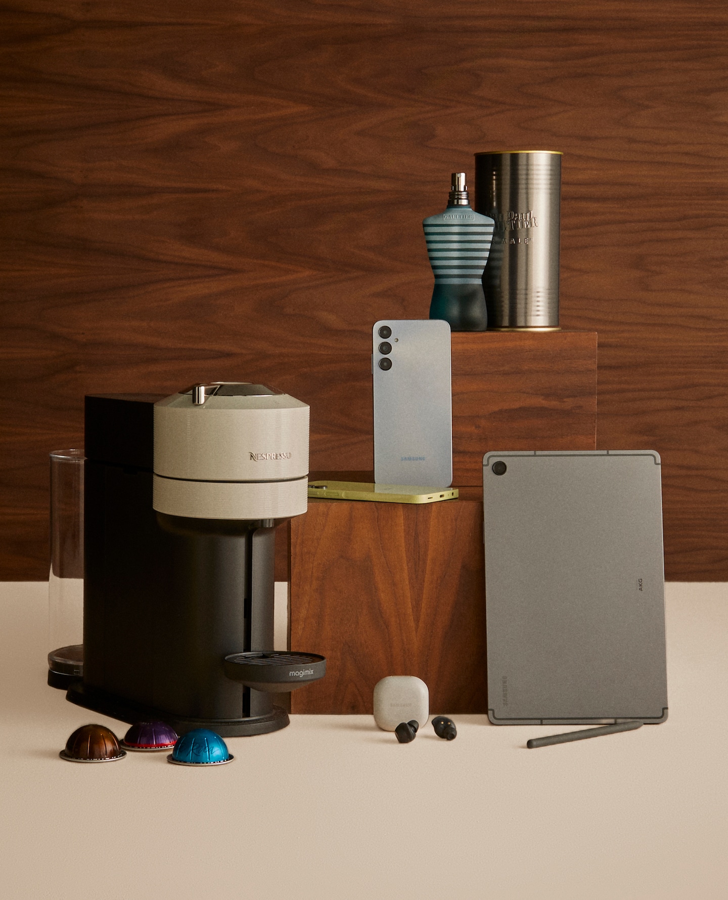 Various gifting items displayed including Nespresso Vertuo Next Coffee Machine, iPhone, Earpods, iPad and JPG Le Male 75ml Eau de Toilette